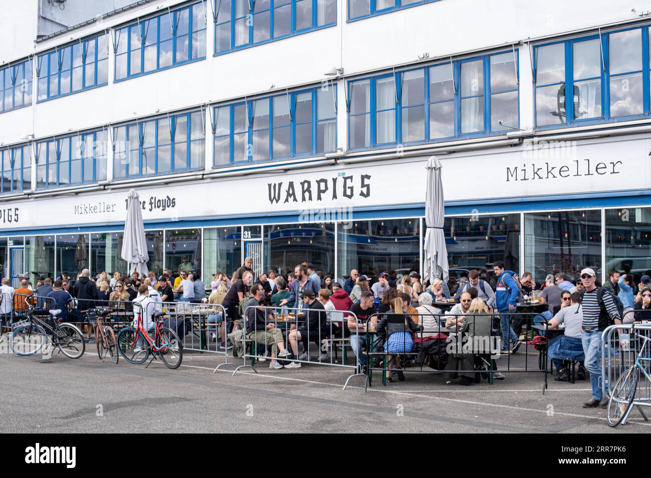 Copenhagen, Denmark, May 07, 2022: People at a bar in the meatpacking district in Vesterbro neighbourhood Stock Photo