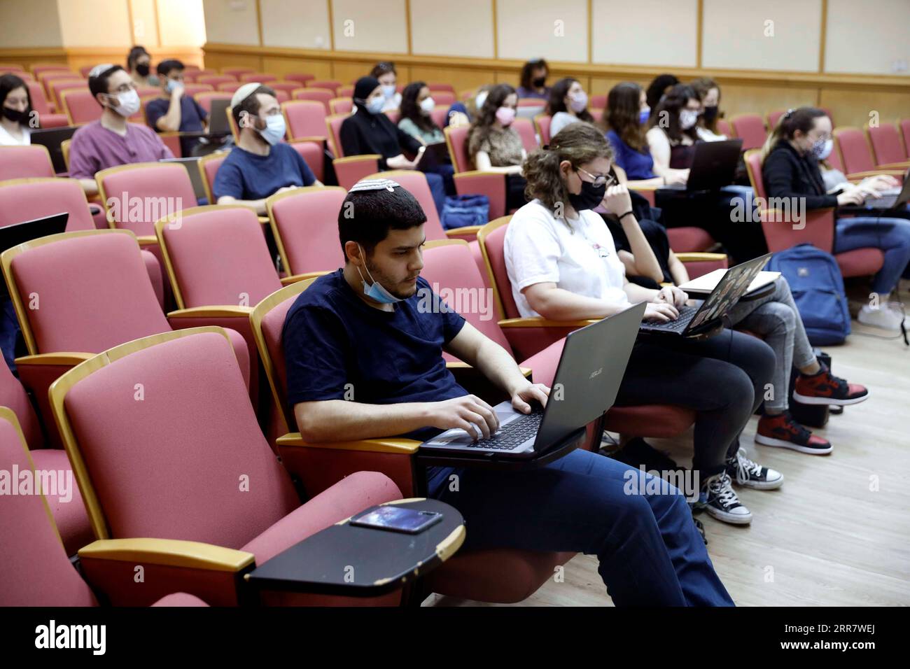 210405 -- RAMAT GAN, April 5, 2021 -- Students study in a classroom at Bar Ilan University at central Israeli city of Ramat Gan on April 5, 2021. Israel s Ministry of Health reported 353 new COVID-19 cases on Monday, raising the total infections in the country to 834,563. The number of patients in serious conditions decreased from 344 to 323, out of the 489 hospitalized patients. This is the lowest number of patients in serious conditions in Israel since Dec. 10, 2020 when it stood at 320. Photo by /Xinhua ISRAEL-RAMAT GAN-COVID-19-CASES GilxCohenxMagen PUBLICATIONxNOTxINxCHN Stock Photo