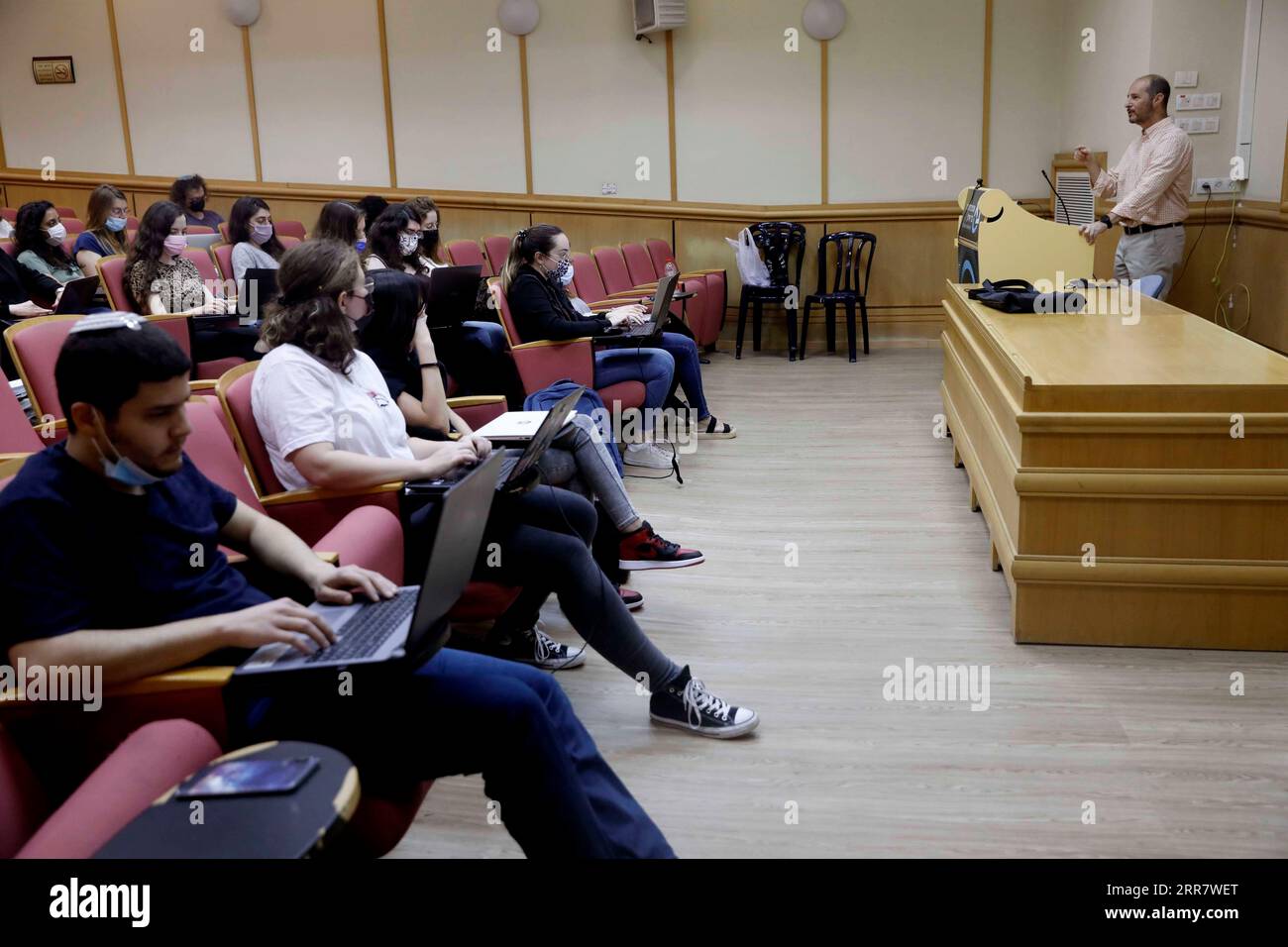 210405 -- RAMAT GAN, April 5, 2021 -- Students study in a classroom at Bar Ilan University at central Israeli city of Ramat Gan on April 5, 2021. Israel s Ministry of Health reported 353 new COVID-19 cases on Monday, raising the total infections in the country to 834,563. The number of patients in serious conditions decreased from 344 to 323, out of the 489 hospitalized patients. This is the lowest number of patients in serious conditions in Israel since Dec. 10, 2020 when it stood at 320. Photo by /Xinhua ISRAEL-RAMAT GAN-COVID-19-CASES GilxCohenxMagen PUBLICATIONxNOTxINxCHN Stock Photo