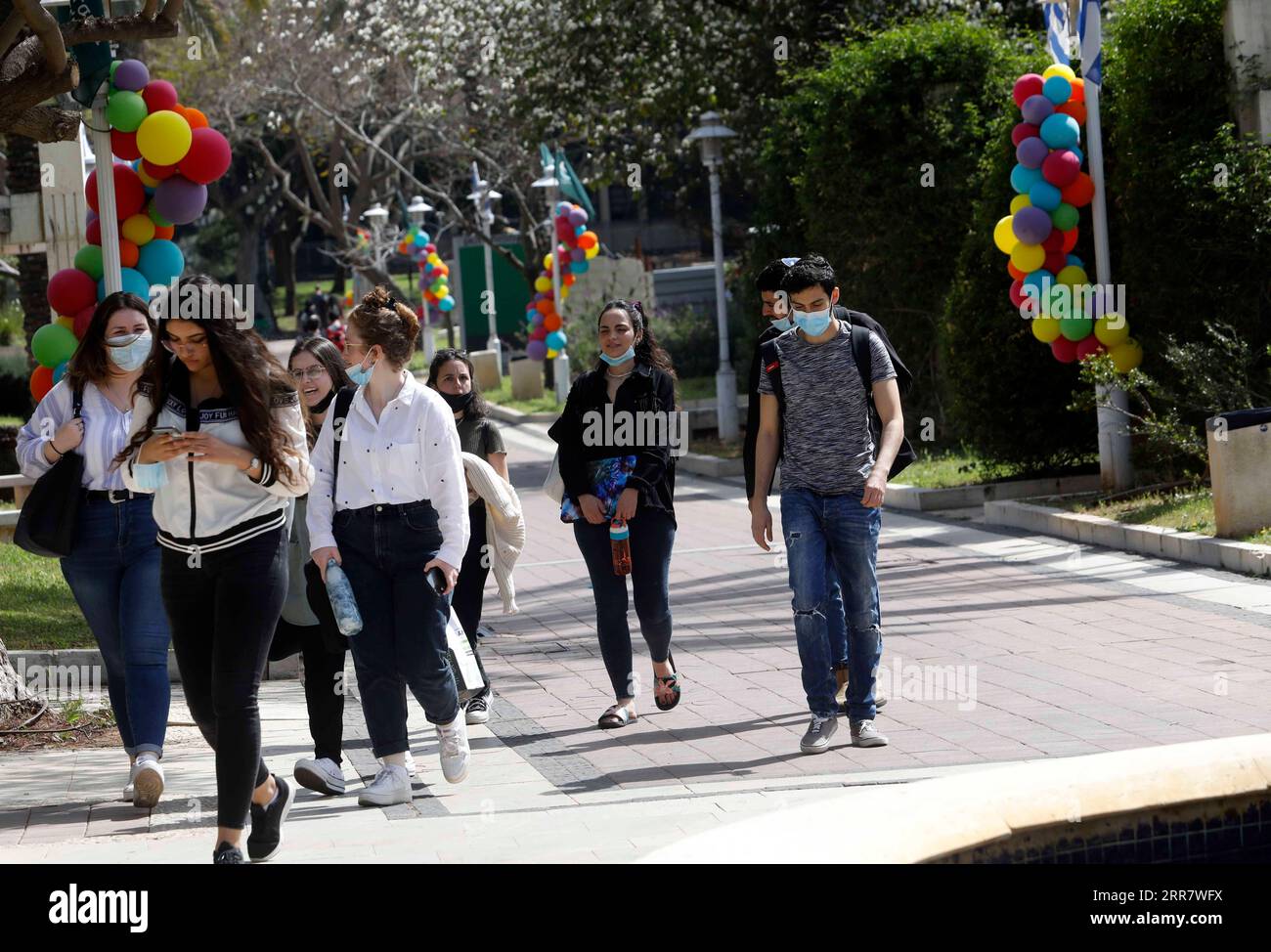 210405 -- RAMAT GAN, April 5, 2021 -- Students walk in the campus at Bar Ilan University at central Israeli city of Ramat Gan on April 5, 2021. Israel s Ministry of Health reported 353 new COVID-19 cases on Monday, raising the total infections in the country to 834,563. The number of patients in serious conditions decreased from 344 to 323, out of the 489 hospitalized patients. This is the lowest number of patients in serious conditions in Israel since Dec. 10, 2020 when it stood at 320. Photo by /Xinhua ISRAEL-RAMAT GAN-COVID-19-CASES GilxCohenxMagen PUBLICATIONxNOTxINxCHN Stock Photo
