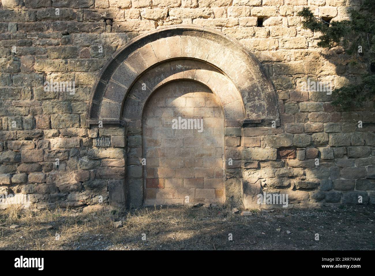 The brickedup door symbolizes the mystery and secrets that lie behind