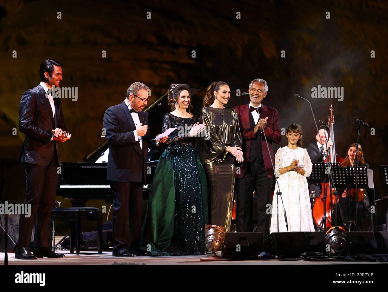 210409 -- AL ULA, April 9, 2021 -- Italian tenor Andrea Bocelli, joined by many musicians, performs at a concert in Al-Ula, northwestern Saudi Arabia, April 8, 2021. The Italian legendary tenor Andrea Bocelli on Thursday evening performed within the walls of Hegra, Saudi Arabia s first UNESCO World Heritage Site. TO GO WITH Italian tenor Bocelli performs in Saudi s world heritage site /Handout via Xinhua SAUDI ARABIA-AL ULA-ANDREA BOCELLI-CONCERT ThexRoyalxCommissionxforxAlUla PUBLICATIONxNOTxINxCHN Stock Photo