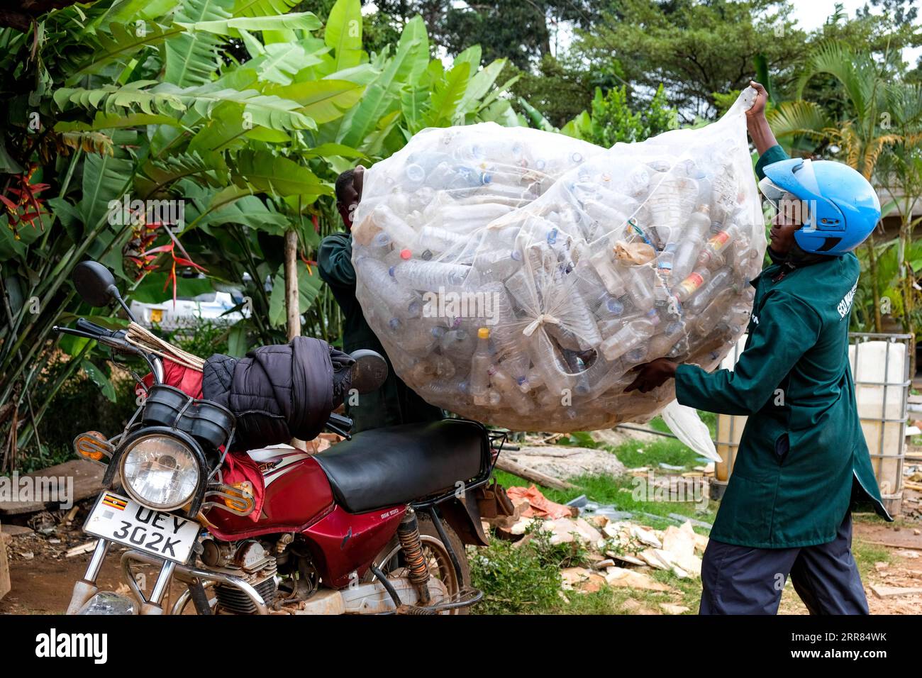 210417 KAMPALA, April 17, 2021 Workers of Eco Ways Uganda place a