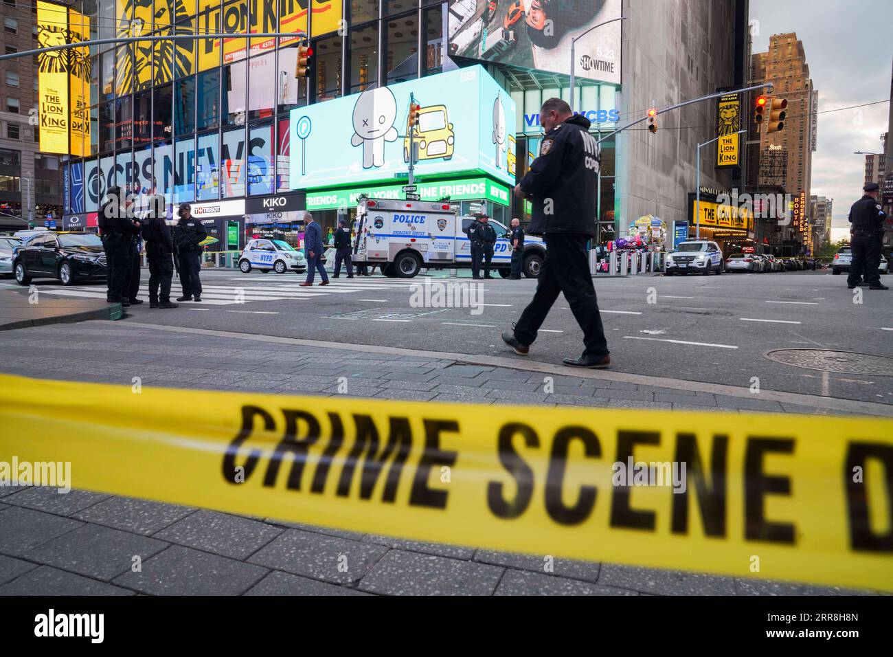 210509 -- NEW YORK, May 9, 2021 -- Policemen stand guard near a shooting scene in Times Square in New York, the United States, May 8, 2021. Two people, including a child, were shot in Times Square on Saturday afternoon, local media reported, citing police sources.  U.S.-NEW YORK-TIMES SQUARE-SHOOTING WangxYing PUBLICATIONxNOTxINxCHN Stock Photo