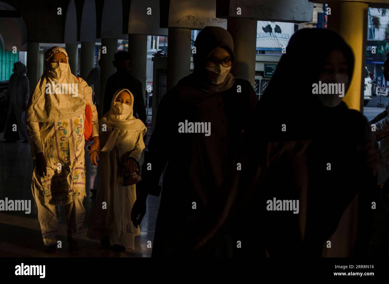 Indonesian muslim woman praying in hi-res stock photography and images ...