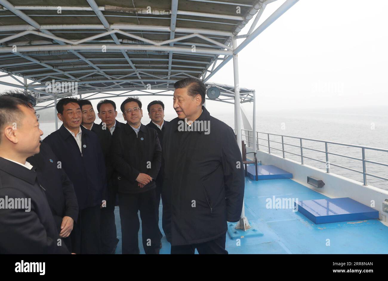 210513 -- NANYANG, May 13, 2021 -- Chinese President Xi Jinping, also general secretary of the Communist Party of China Central Committee and chairman of the Central Military Commission, inspects the Danjiangkou Reservoir and listens to introductions to the construction, management and operation of the middle route of the South-to-North Water Diversion Project, and the ecological conservation of the water source region in Xichuan County, Nanyang, central China s Henan Province, May 13, 2021.  CHINA-HENAN-NANYANG-XI JINPING-INSPECTION CN WangxYe PUBLICATIONxNOTxINxCHN Stock Photo
