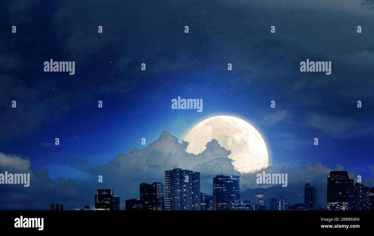 Skyscrapers and modern buildings with a full moon in the night ...