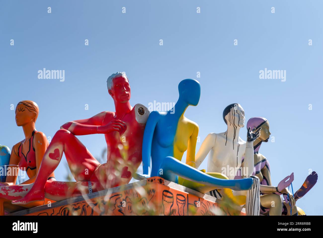 The Hague, Holland-July 26 2023: Closeup view of colorful manikin on the rooftop Stock Photo