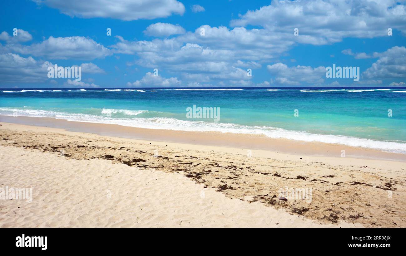 Beach with Blue Sky taken at Bali, Indonesia Stock Photo