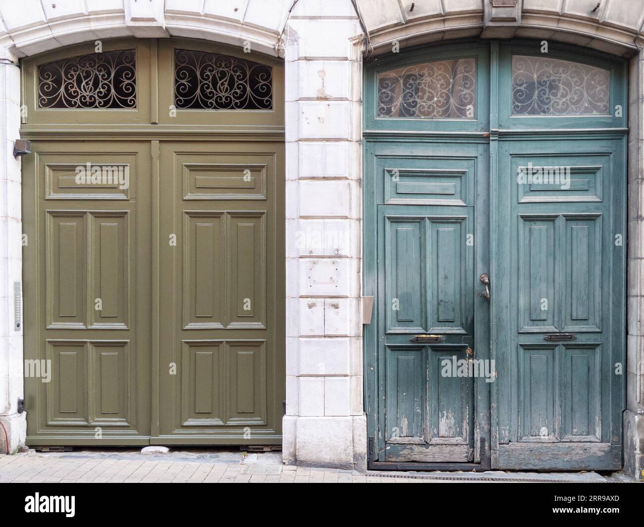 restored wooden door facade before and after painting and repair by
