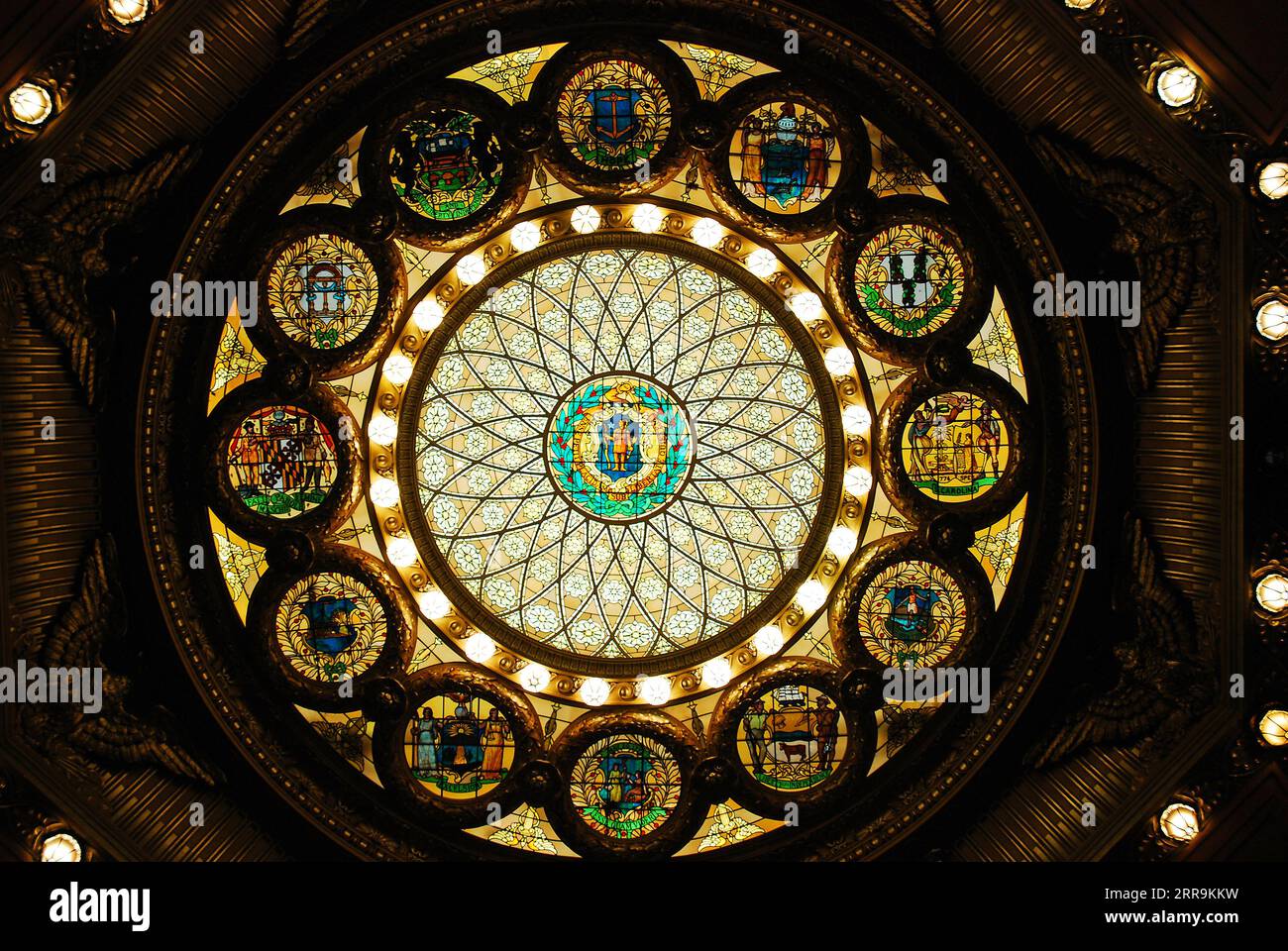 The stained glass window stands above the atrium in the Massachusetts State House, Boston Stock Photo