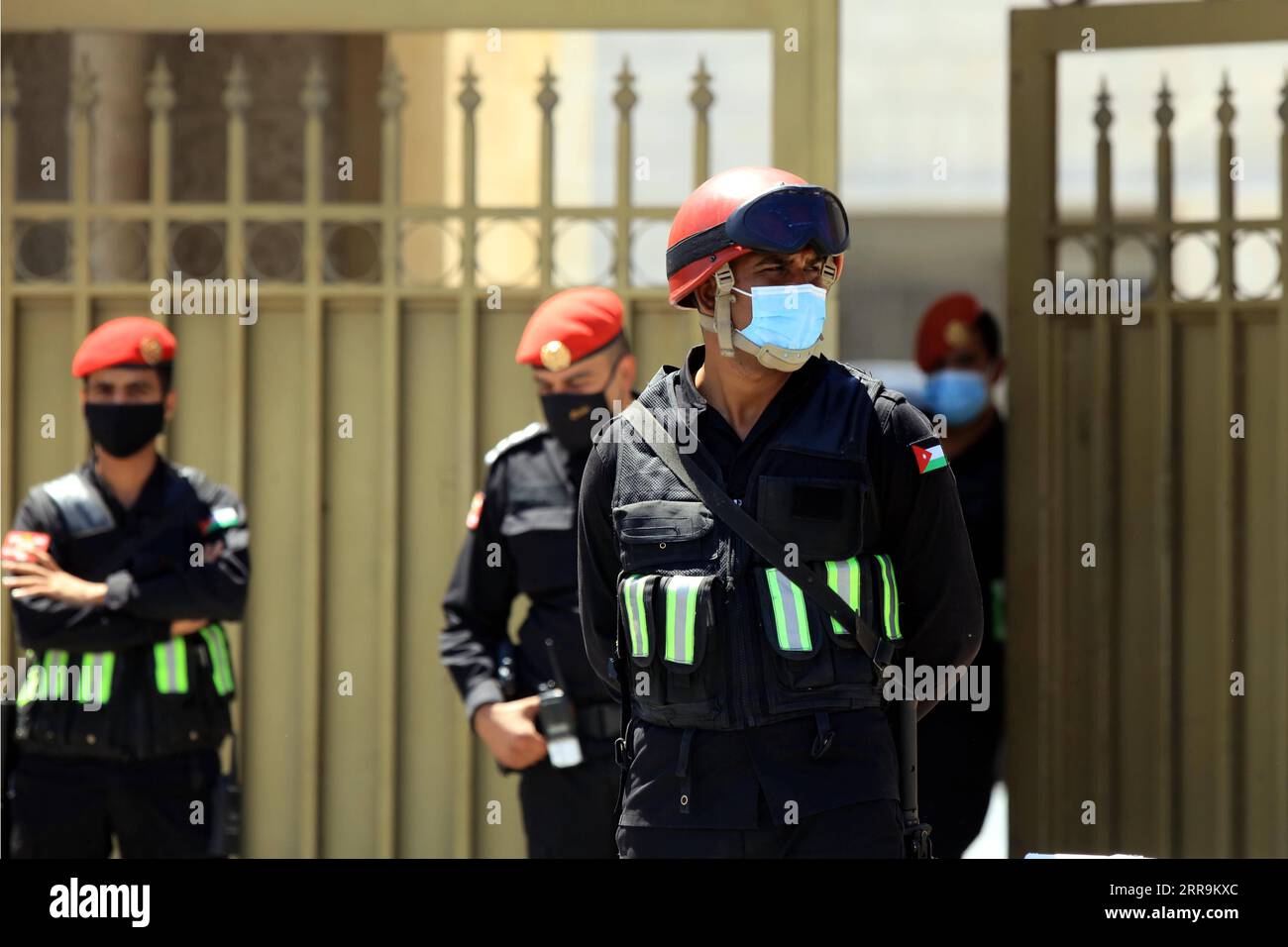 210622 -- AMMAN, June 22, 2021 -- Security members stand guard outside the State Security Court in Amman, Jordan, on June 21, 2021. Bassem Awadallah, Jordan s former finance minister and royal court chief, and royal family member Sharif Hassan Ben Zeid on Monday pled not guilty to the charges of sedition against the regime, Awadallah s chief lawyer Mohammad Afif told Xinhua. Photo by /Xinhua JORDAN-AMMAN-TRIAL-SEDITION-EX MINISTER MohammadxAbuxGhosh PUBLICATIONxNOTxINxCHN Stock Photo