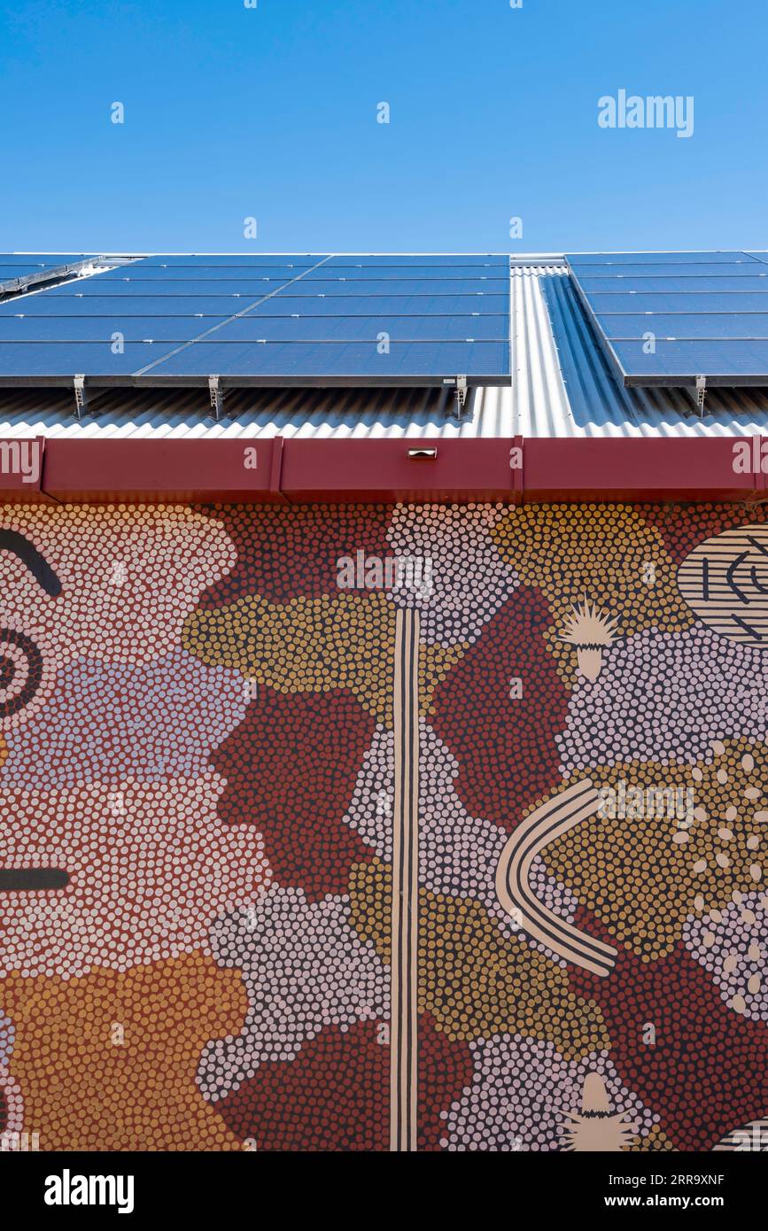 Solar panels on the roof and indigenous art on the wall of the Araluen Arts Centre near Alice Springs (Mparntwe) in the Northern Territory, Australia Stock Photo