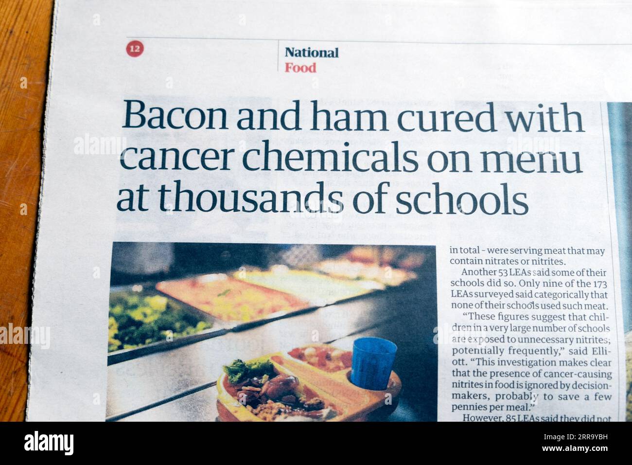 'Bacon and ham cured with cancer chemicals on menu at thousands of schools' Guardian newspaper headline school food article 2 September 2023 London UK Stock Photo