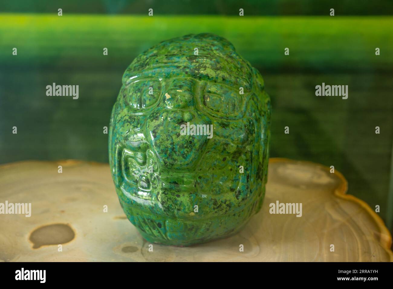 A jade sculpture of Kinich Ahau, the Mayan Sun God, in the museum at