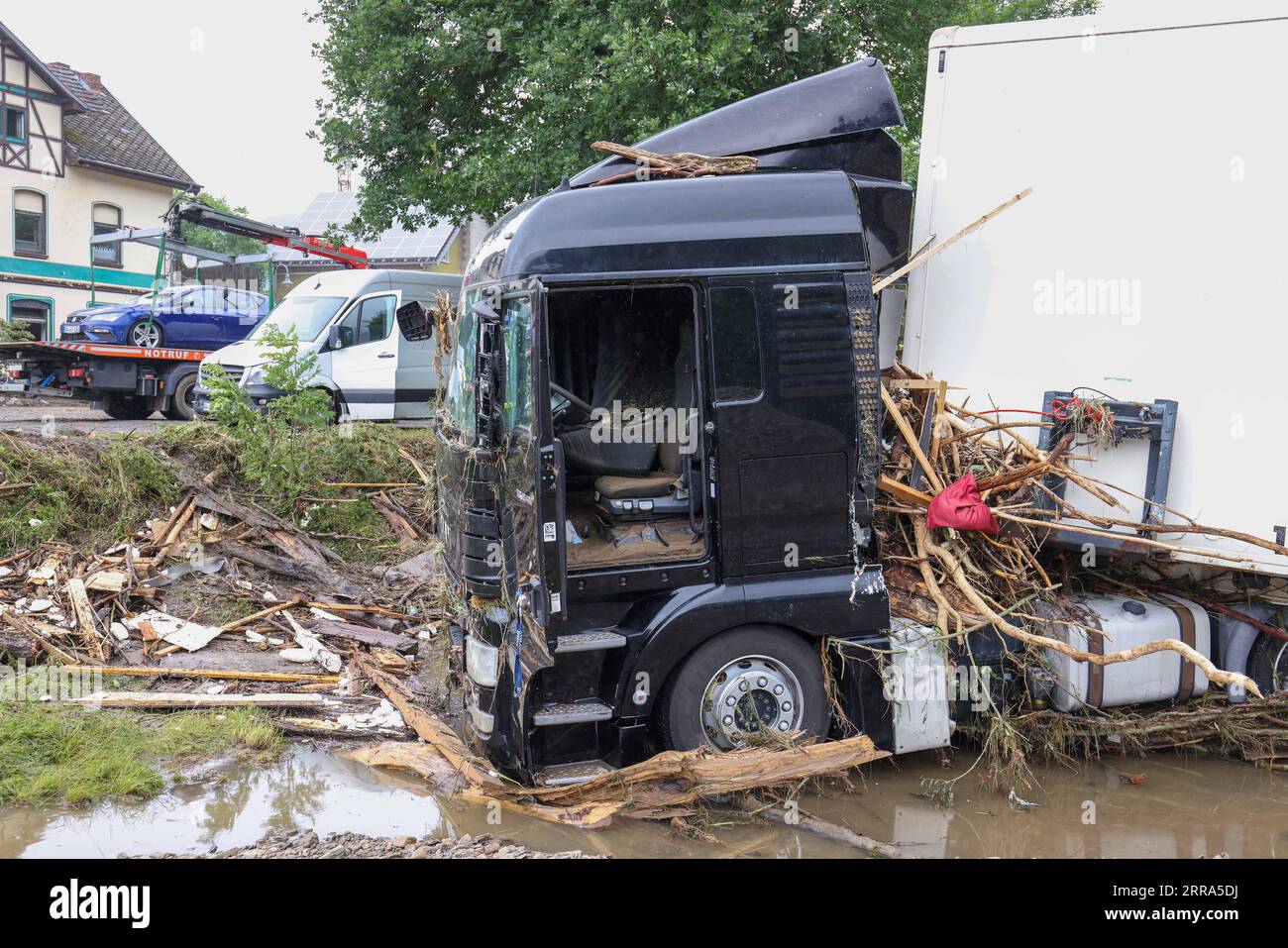 210716 -- AHRWEILER, July 16, 2021 -- Photo taken on July 16, 2021 shows vehicles damaged in flood disaster in Schuld, a town in Ahrweiler, Germany. The death toll from the flood disaster triggered by heavy rainfall in western and southern Germany has risen to more than 100 as of Friday noon local time, according to police and local authorities. Photo by /Xinhua GERMANY-AHRWEILER-FLOODS JoachimxBywaletz PUBLICATIONxNOTxINxCHN Stock Photo