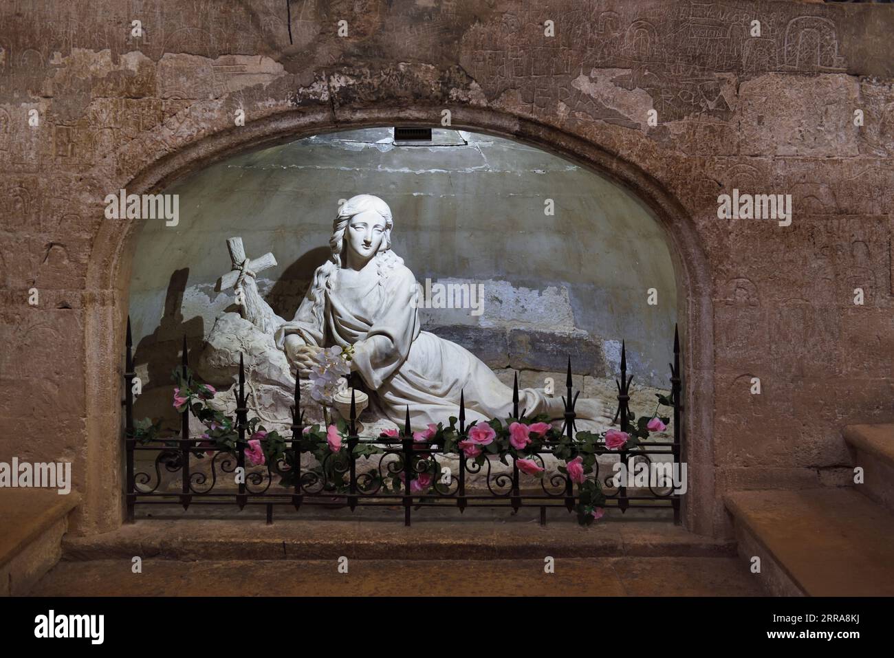 Sculpture of Mary Magdalene next to Her Tomb in Church or Basilica of Mary Magdalene Saint