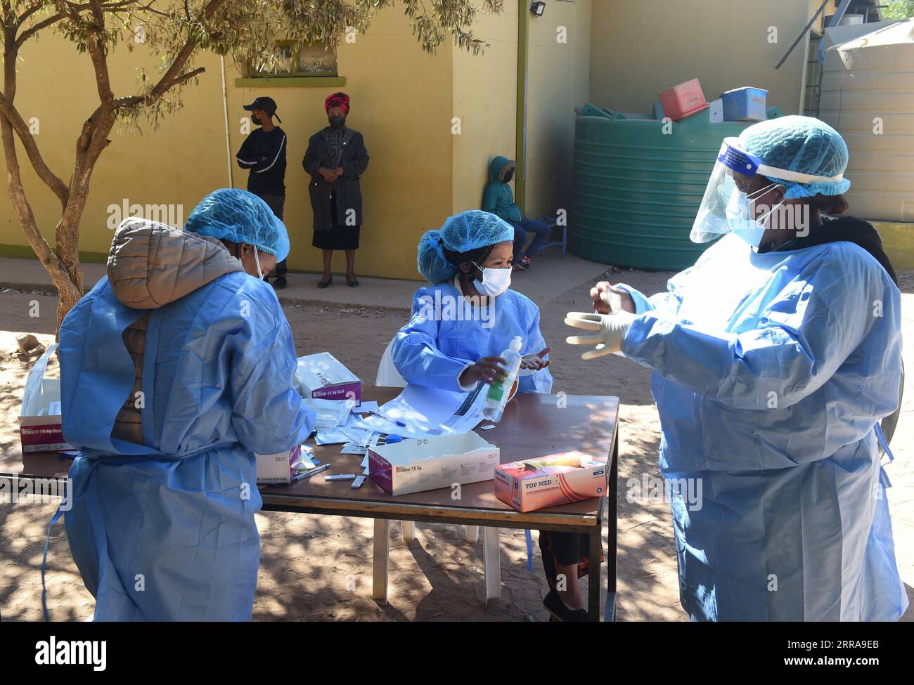 210722 -- KWENENG DISTRICT BOTSWANA, July 22, 2021 -- Nurses work at a vaccinating and testing center in Kweneng District, Botswana, on July 22, 2021. Botswana s President, Mokgweetsi Masisi on Thursday urged citizens to get COVID-19 vaccines when their turn came, stating that all of the vaccines had been tested and approved by the appropriate authorities. Photo by /Xinhua BOTSWANA-KWENENG DISTRICT-VACCINATION ROLLOUT TshekisoxTebalo PUBLICATIONxNOTxINxCHN Stock Photo