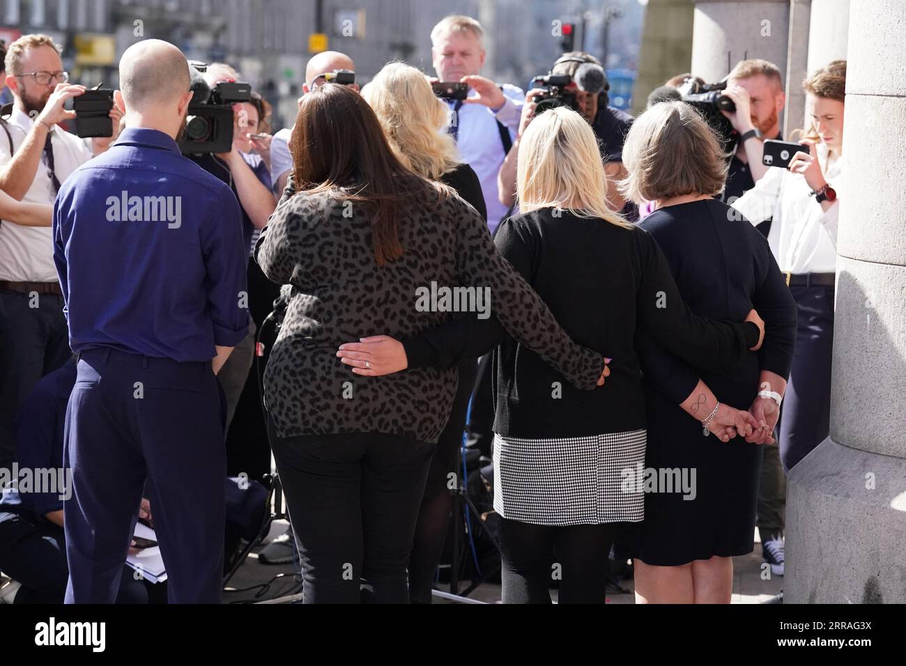 Diane Stuchbury (right), widow of Christopher Stuchbury, with family members Karen (second right), Lyndsey and Neil, listen to solicitor Lisa Gregory make a statement, at the High Court in Aberdeen, where Network Rail admitted health and safety failings over over the Stonehaven rail crash. Train driver Brett McCullough, 45, conductor Donald Dinnie, 58, and passenger Christopher Stuchbury, 62, died in the crash near Stonehaven, Aberdeenshire, on August 12, 2020. Picture date: Thursday September 7, 2023. Stock Photo