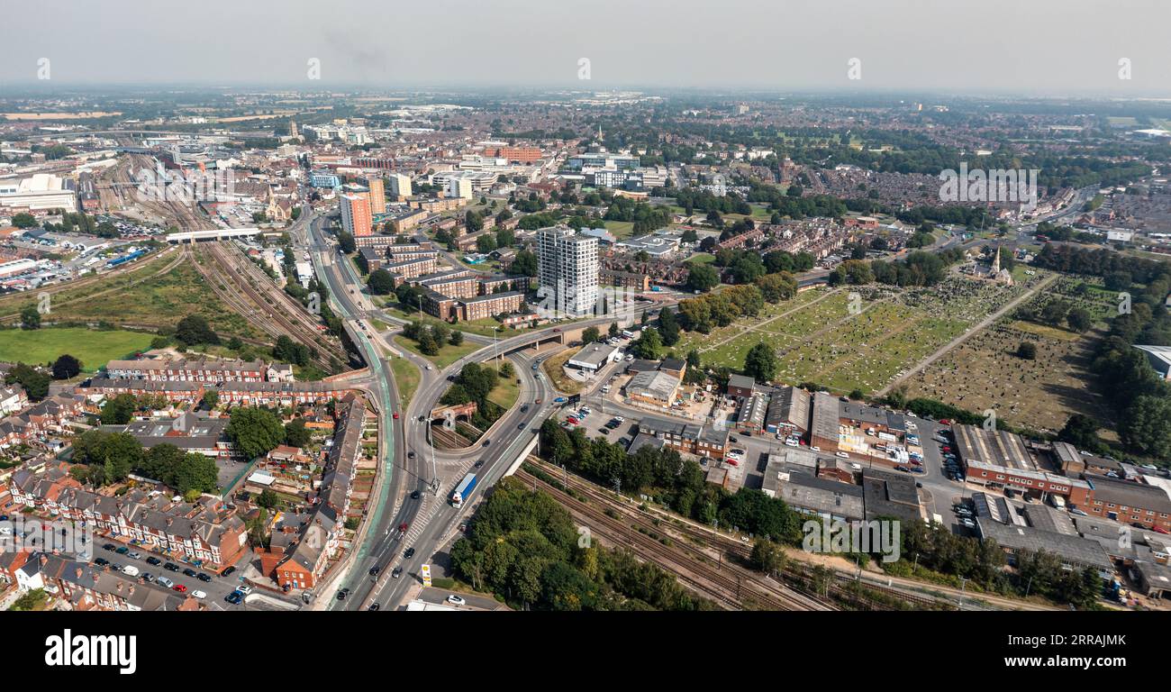 An aerial panoramic view of Doncaster city centre in a cityscape skyline with road and rail