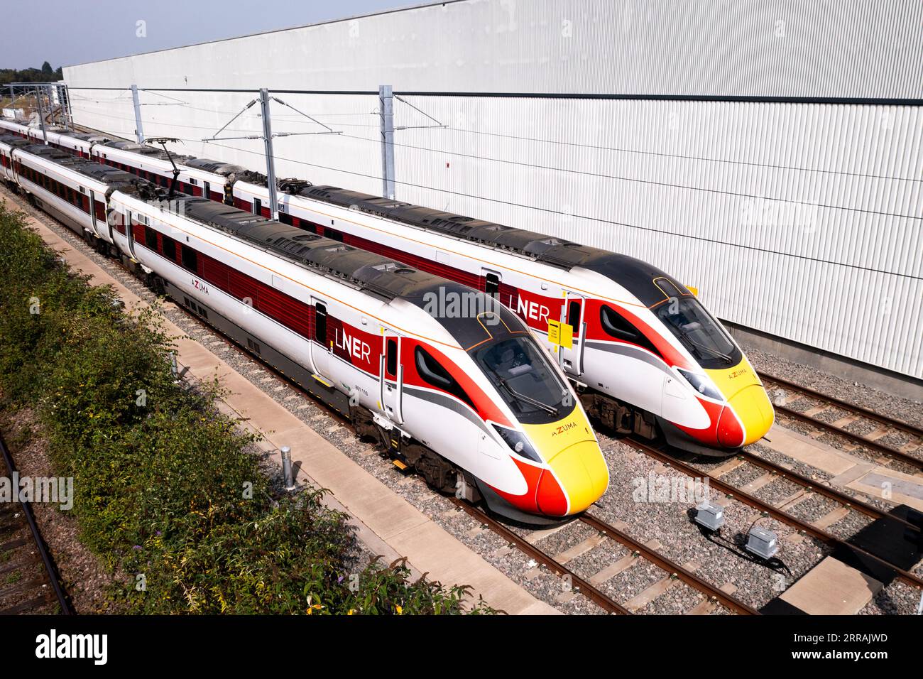 DONCASTER, UK - SEPTEMBER 6, 2023.  Aerial view of new Hitachi Azuma AT300 Intercity passenger trains in LNER livery on the maintenance depot in Donca Stock Photo