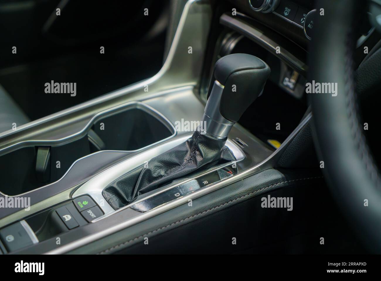 Modern car gear lever with intuitive control buttons. Effortless shifting, a symphony of ergonomic design. Stock Photo