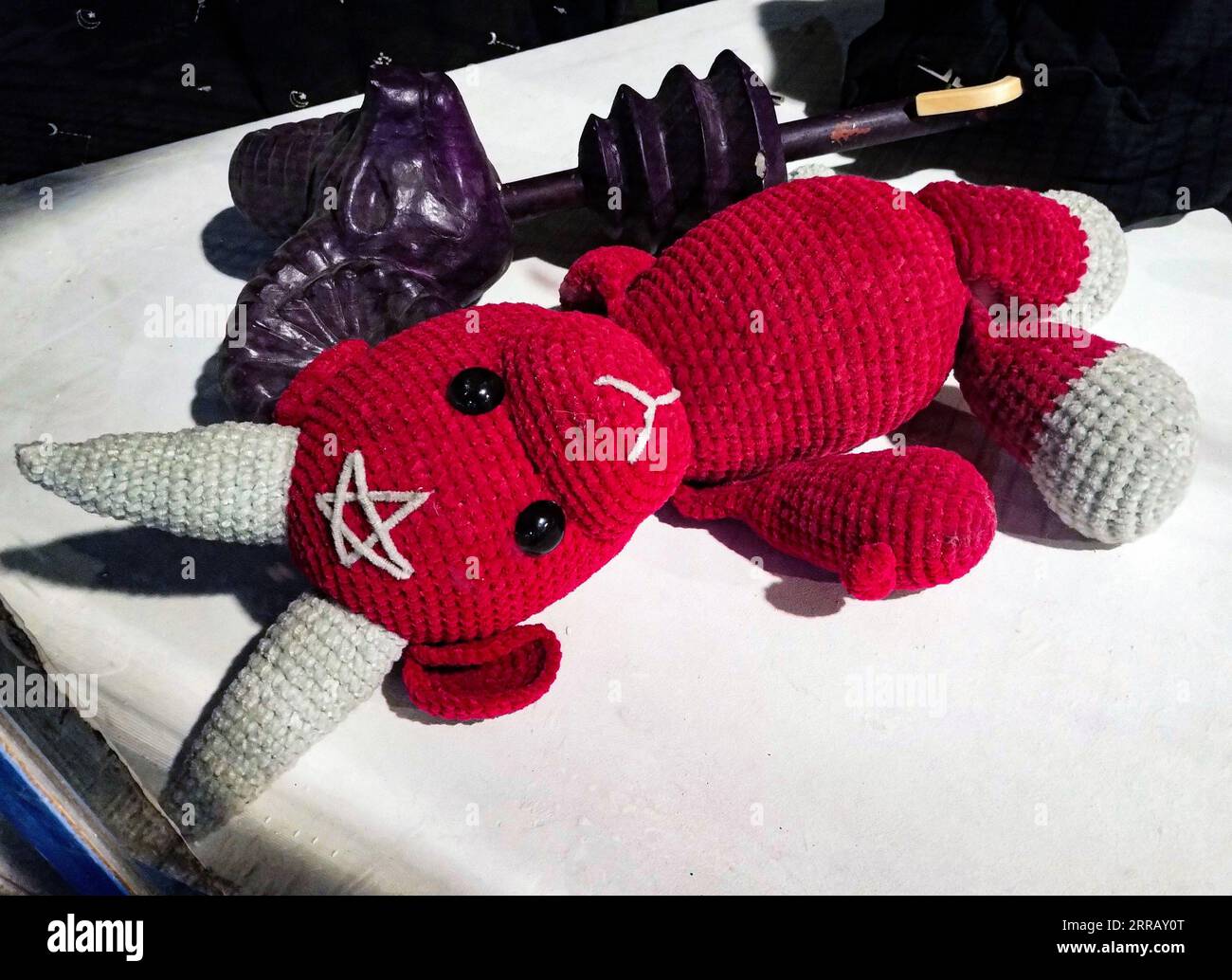 satanic crochet red plush toy with ritual and occult elements