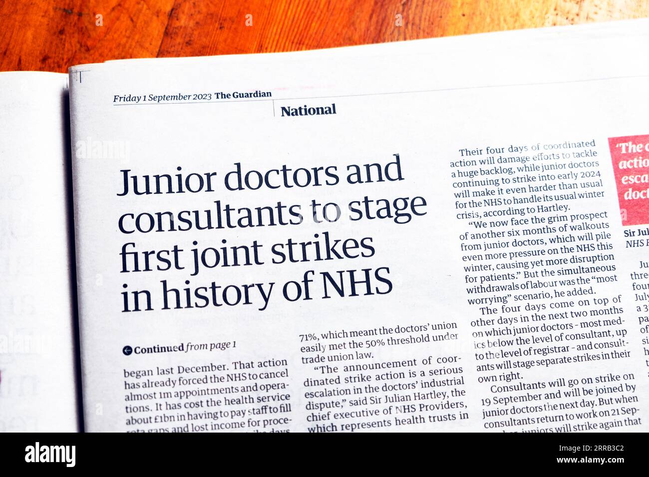 'Junior doctors and consultants to stage first joint strikes in history of NHS' Guardian newspaper headline article 1 September 2023 London England UK Stock Photo