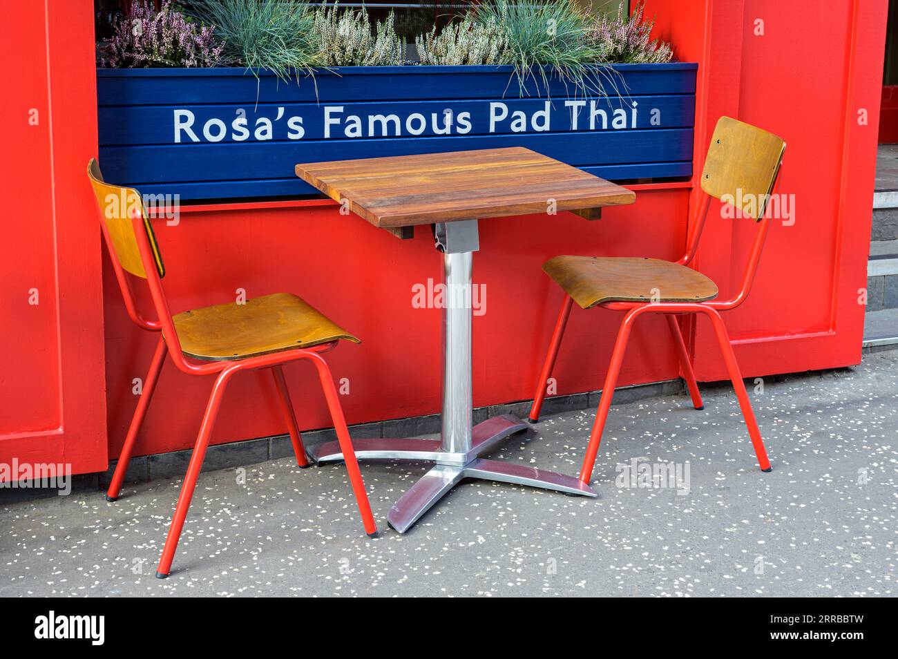 Empty table at the exterior of Rosa's Famous Pad Thai restaurant, West Nile Street, Glasgow