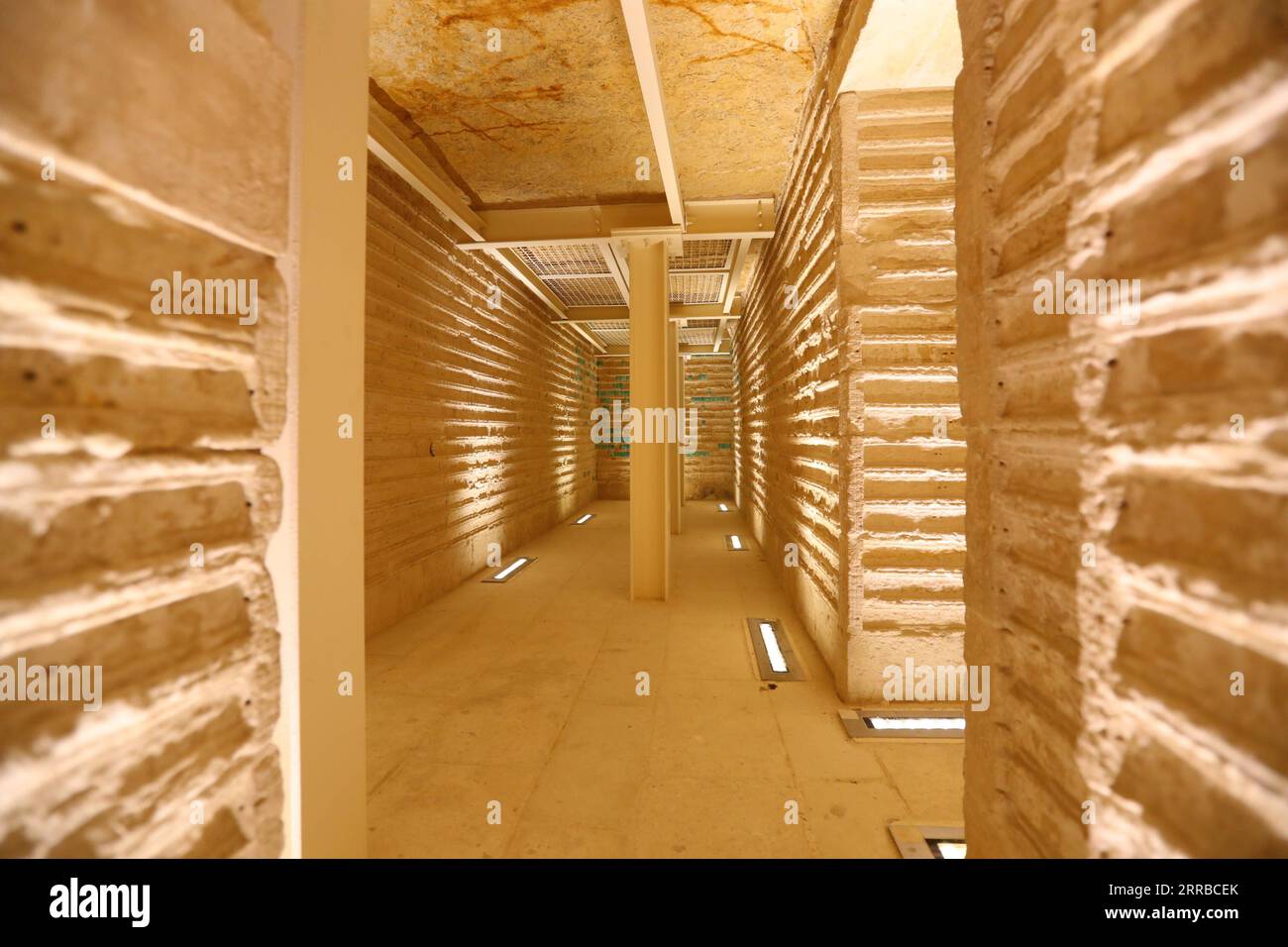 210914 -- SAQQARA, Sept. 14, 2021 -- Photo shows the interior of the south tomb of King Djoser in Saqqara necropolis, south of Cairo, Egypt, on Sept. 14, 2021. Egypt on Monday opened the south tomb of King Djoser after restoration in Saqqara necropolis near the capital Cairo. The restoration process started in 2006 and involved conservation and restoration work of the lower corridors, strengthening the walls and ceilings, complete the interior inscriptions in the tomb as reassembling the granite sarcophagus.  EGYPT-SAQQARA-SOUTH TOMB OF KING DJOSER-RESTORATION-OPEN SuixXiankai PUBLICATIONxNOTx Stock Photo