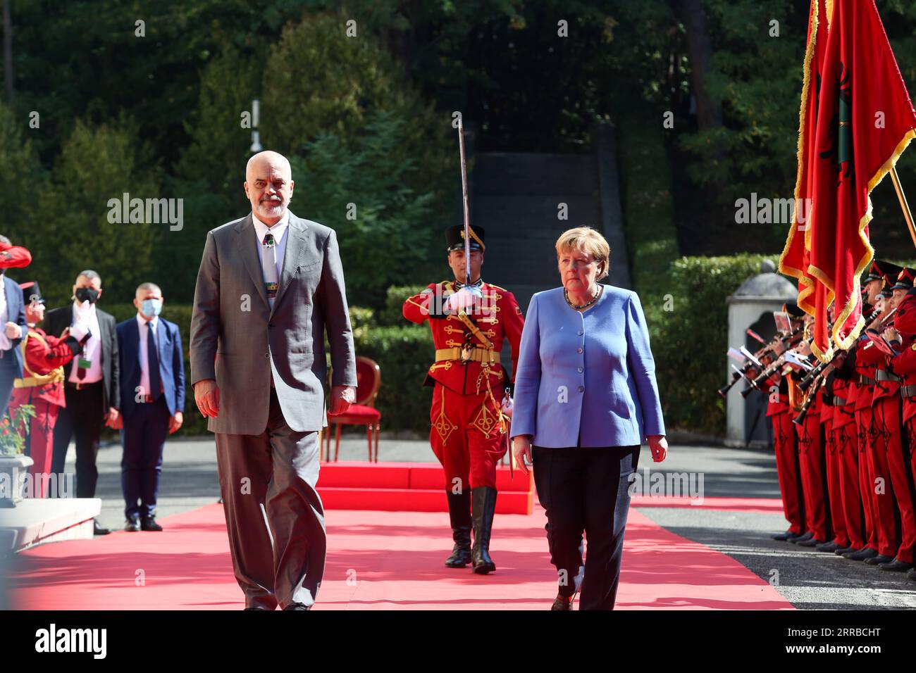 210914 -- TIRANA, Sept. 14, 2021 -- Albanian Prime Minister Edi Rama L and German Chancellor Angela Merkel inspect the guard of honor at the Palace of Brigades in Tirana, Albania, Sept. 14, 2021. Photo by /Xinhua ALBANIA-TIRANA-PM-GERMANY-MERKEL GentxOnuzi PUBLICATIONxNOTxINxCHN Stock Photo