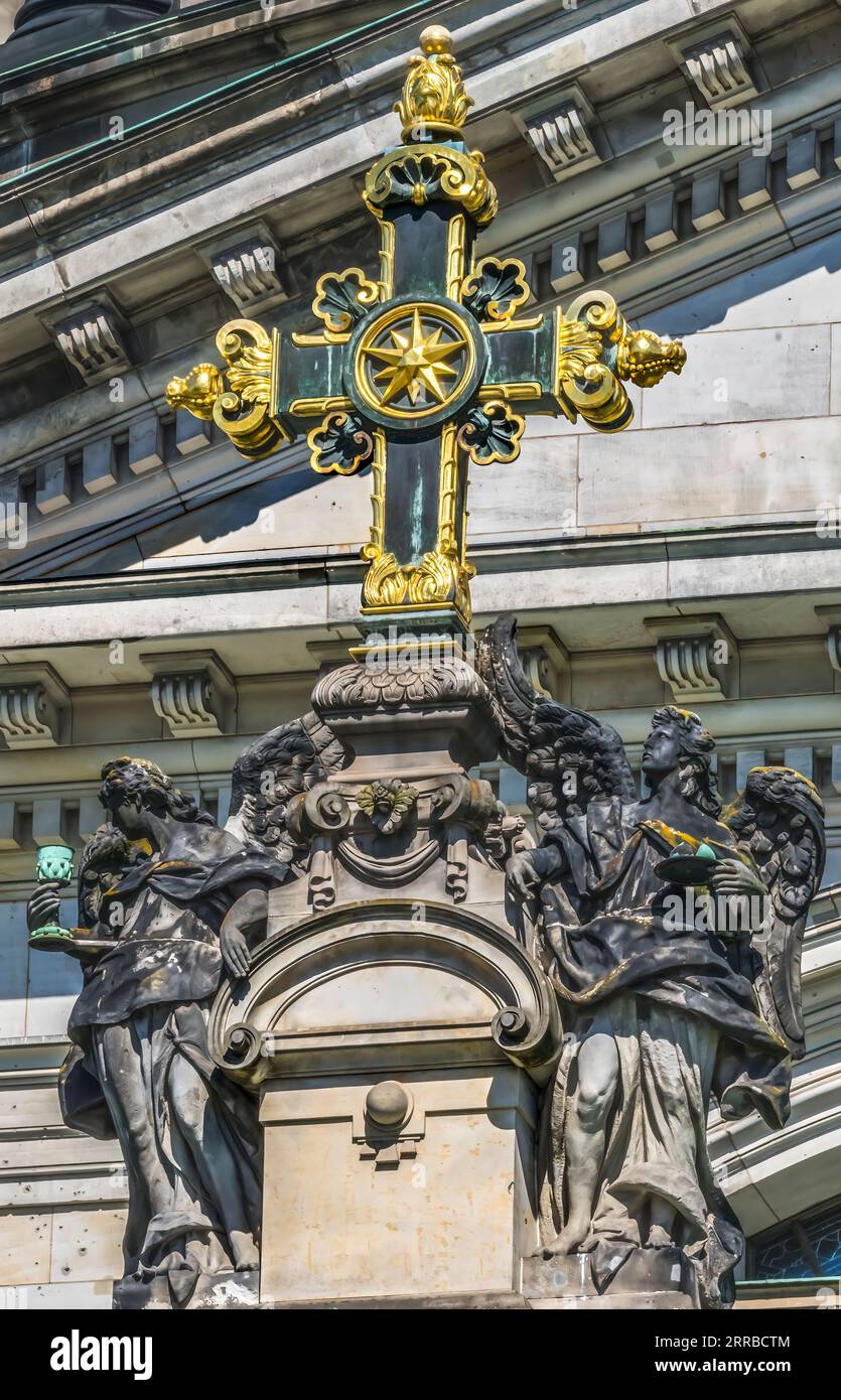Golden Cross Angels Statues Berlin Cathedral Berliner Dom Berlin Germany. Largest Protestant Church in Germany. Built 1905, but church goes back to 14 Stock Photo