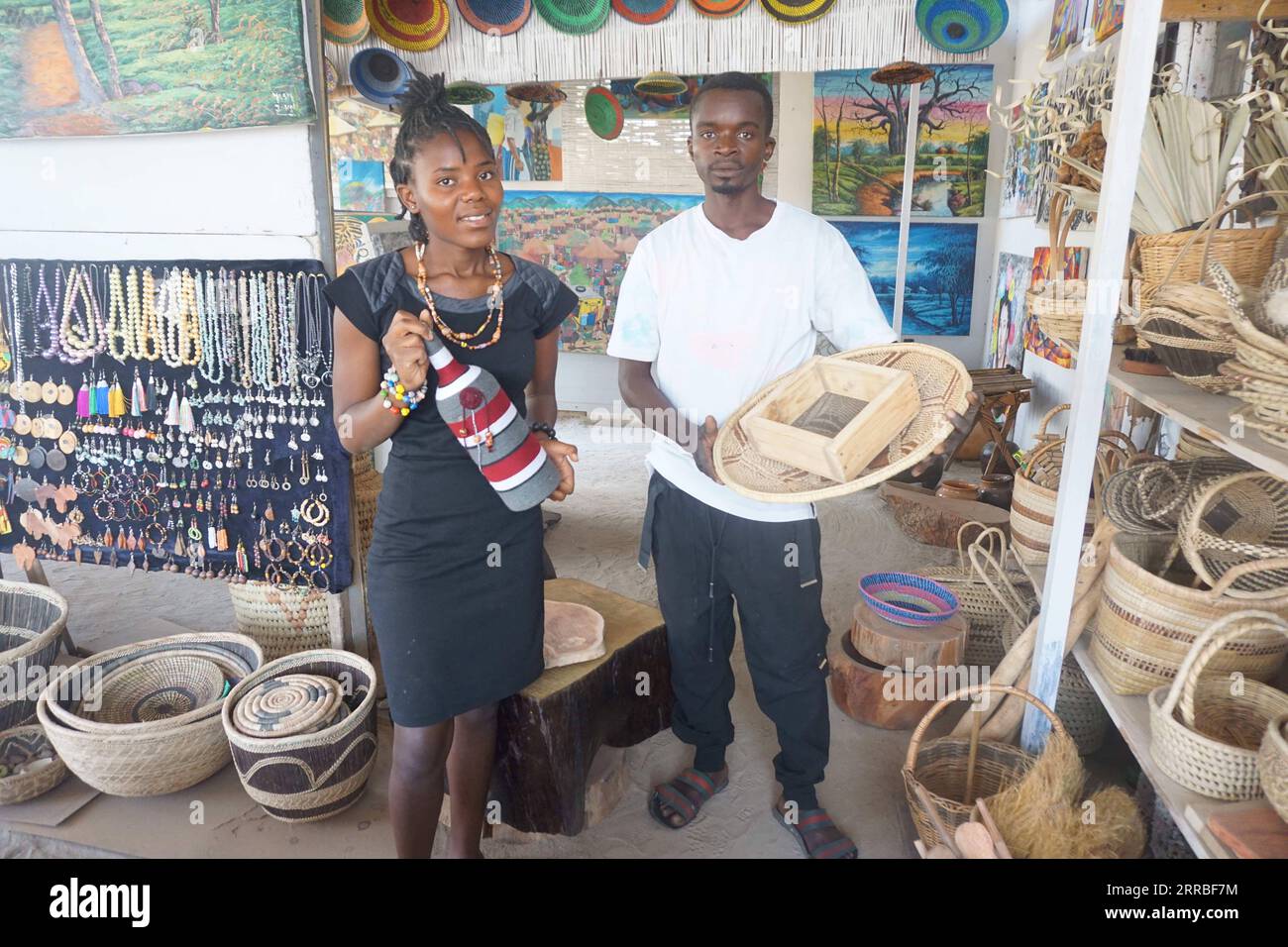 210918 -- LUSAKA, Sept. 18, 2021 -- Young people show handicrafts at Manja Arts center in Mtendere Township of Lusaka, Zambia, on Sept. 13, 2021. For many young people in Mtendere Township of Lusaka, Manja Arts center serves as a recreational space as well as a springboard for art-based businesses. Photo by /Xinhua TO GO WITH Feature: Zambian artist nurturing youths in businesses ZAMBIA-LUSAKA-ARTIST-BUSINESSES LillianxBanda PUBLICATIONxNOTxINxCHN Stock Photo