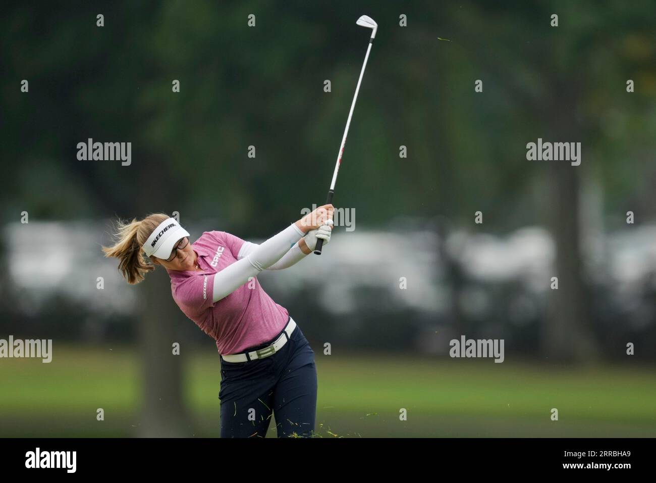 Brooke Henderson, of Canada, plays a shot from the fairway on the first