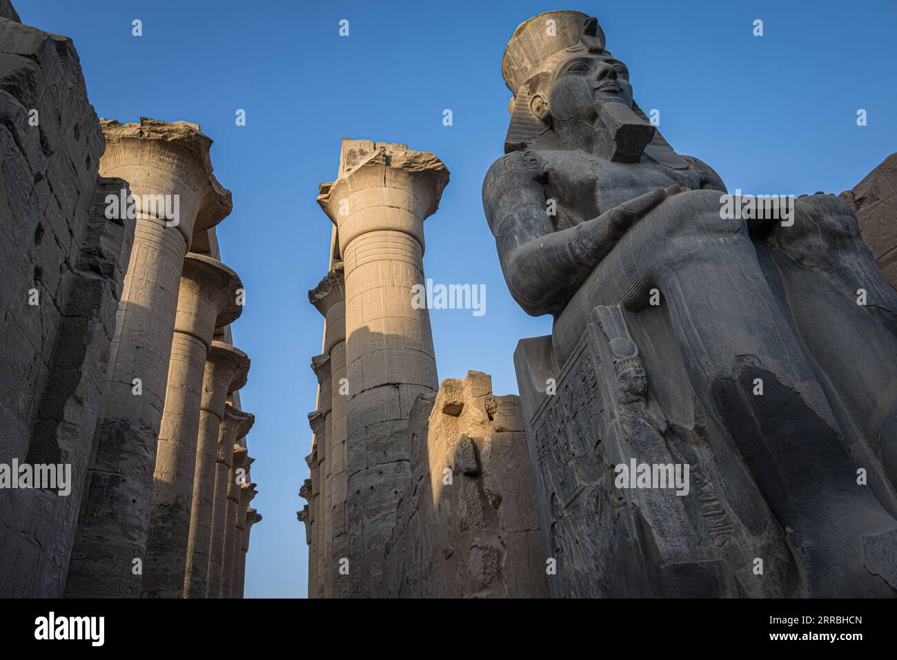 Columns and statues of the Pharoahs at the luxor Temple, Luxor, Egypt Stock Photo