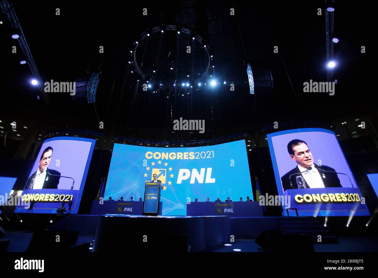 210926 -- BUCHAREST, Sept. 26, 2021 -- Incumbent Chairman of National Liberal Party PNL and Speaker of the Chamber of Deputies Ludovic Orban addresses PNL Congress in Bucharest, Romania, Sept. 25, 2021. Romanian Prime Minister Florin Citu was elected Saturday Chairman of the main ruling National Liberal Party PNL at the party congress. Citu, 49, won 60.2 percent of the votes in the voting of nearly 5,000 delegates from around the country, defeating incumbent Chairman and Speaker of the Chamber of Deputies Ludovic Orban who sought a new mandate. Photo by /Xinhua ROMANIA-BUCHAREST-PNL-NEW CHAIRM Stock Photo