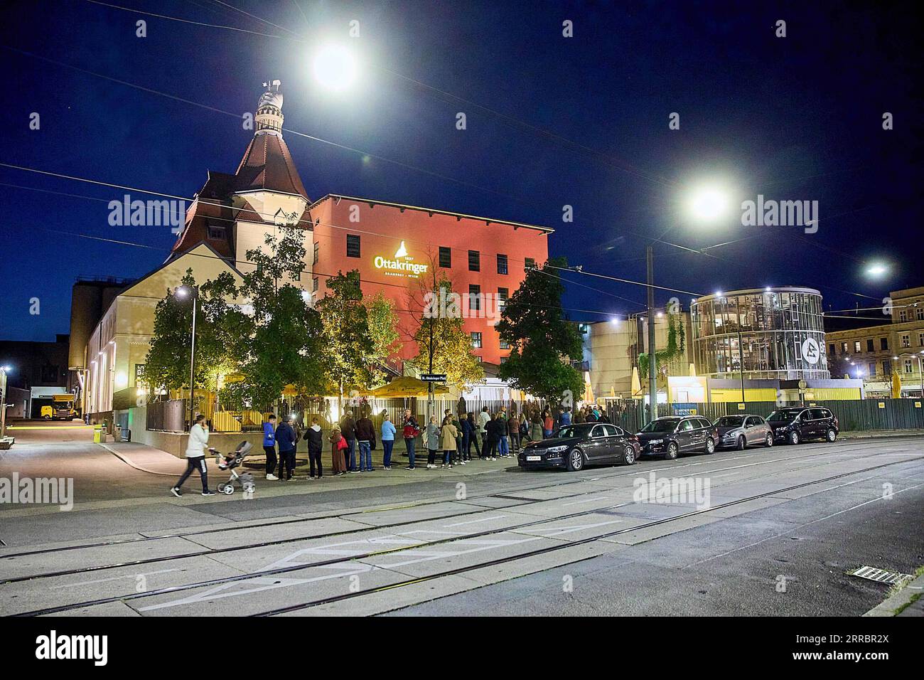 211003 -- VIENNA, Oct. 3, 2021 -- People line up to visit the Ottakringer Brewery in Vienna, Austria, on Oct. 2, 2021. The Ottakringer Brewery was transformed into a museum for one night to greet visitors as part of the Long Night of Museums on Saturday. Around 640 museums, galleries, and cultural institutions presented their collections and exhibitions during the Long Night of Museums. Photo by /Xinhua AUSTRIA-VIENNA-LONG NIGHT OF MUSEUMS-OTTAKRINGER BREWERY GeorgesxSchneider PUBLICATIONxNOTxINxCHN Stock Photo