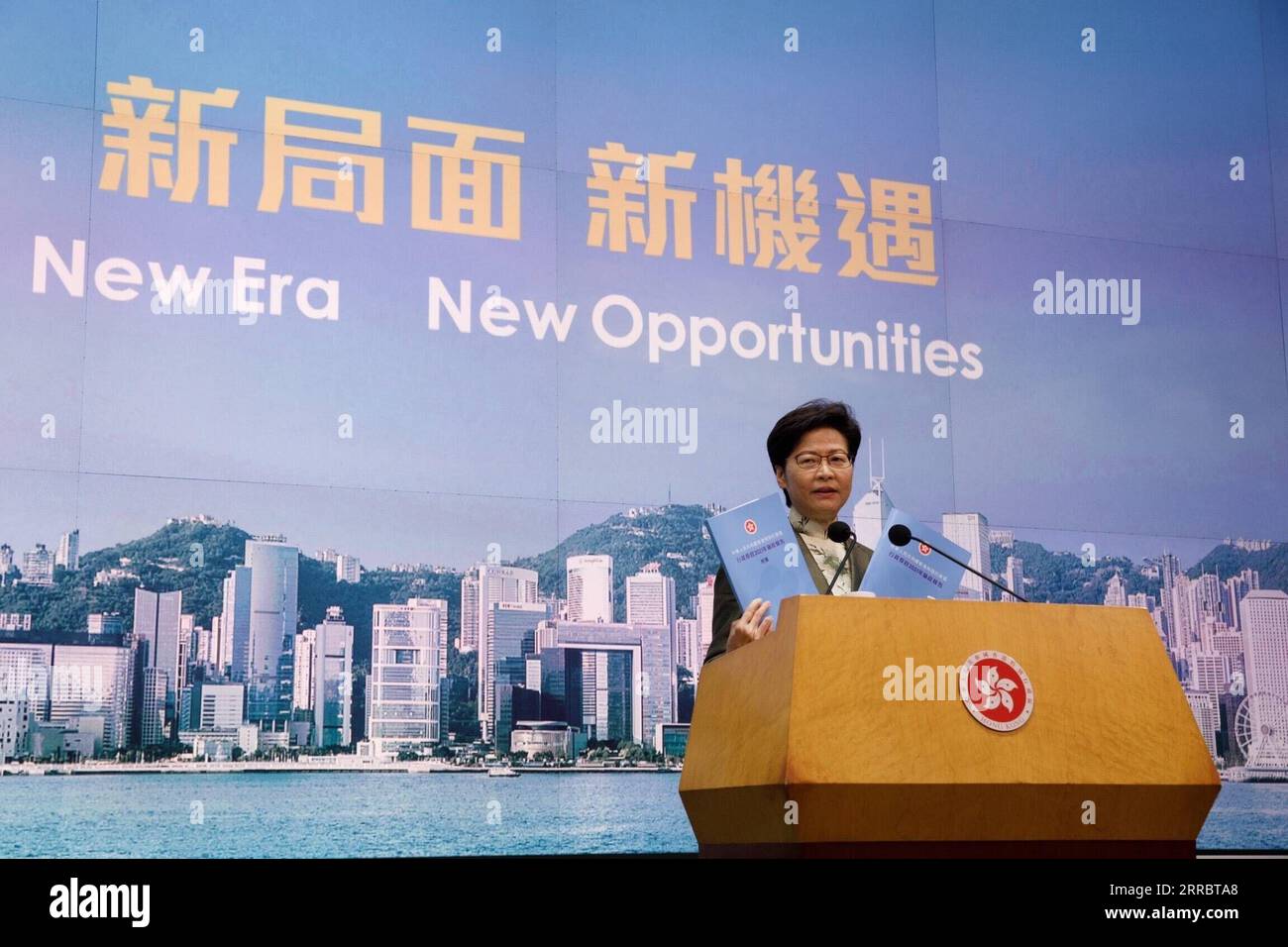 211006 -- HONG KONG, Oct. 6, 2021 -- Chief Executive of China s Hong Kong Special Administrative Region HKSAR Carrie Lam speaks during a press conference in Hong Kong, south China, Oct. 5, 2021. Carrie Lam unveiled Wednesday an array of new measures to reinforce Hong Kong s status as a global financial hub, including improving the listing regime of the stock market and facilitating the cross-boundary flow of renminbi. The 2021 policy address, the fifth of its kind since Lam took office in 2017, focuses on bolstering Hong Kong s economy, tackling an entrenched housing shortage and prompting Hon Stock Photo