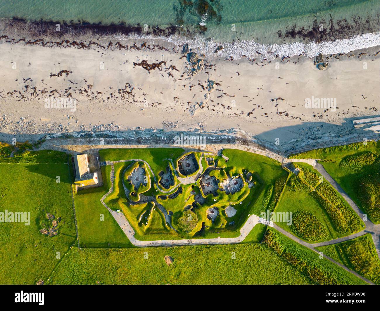 Aerial view of Skara Brae stone-built Neolithic settlement, located on the Bay of Skaill , west mainland, Orkney Islands, Scotland, UK. Stock Photo