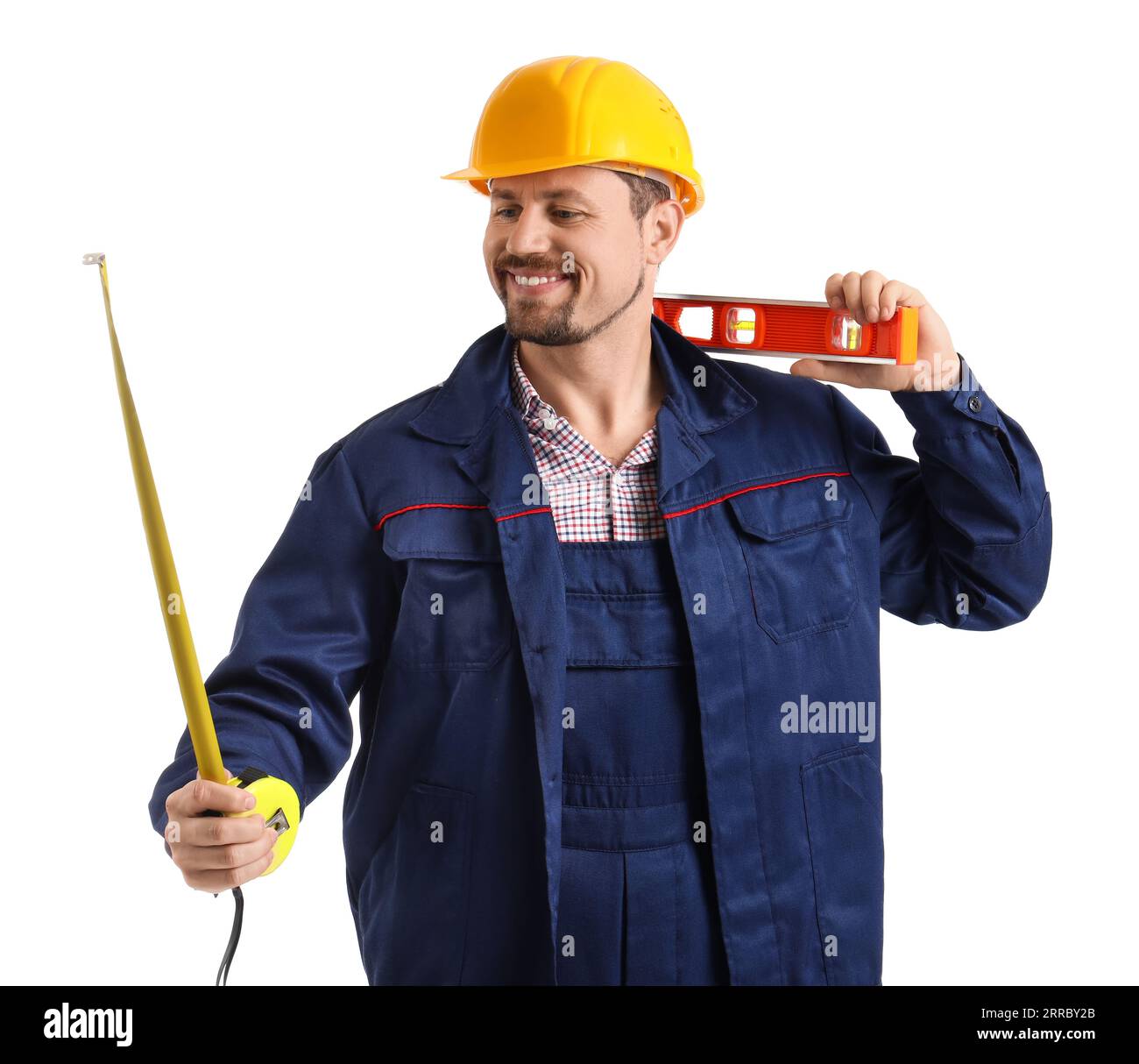 Builders Using Measure Male builder with tape measure and level on white background Stock ...