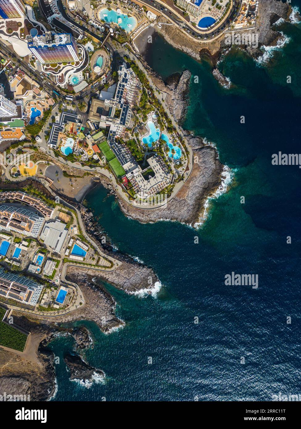 ocean blue water shore and mountains of Playa Paraiso, Tenerife, Canary ...