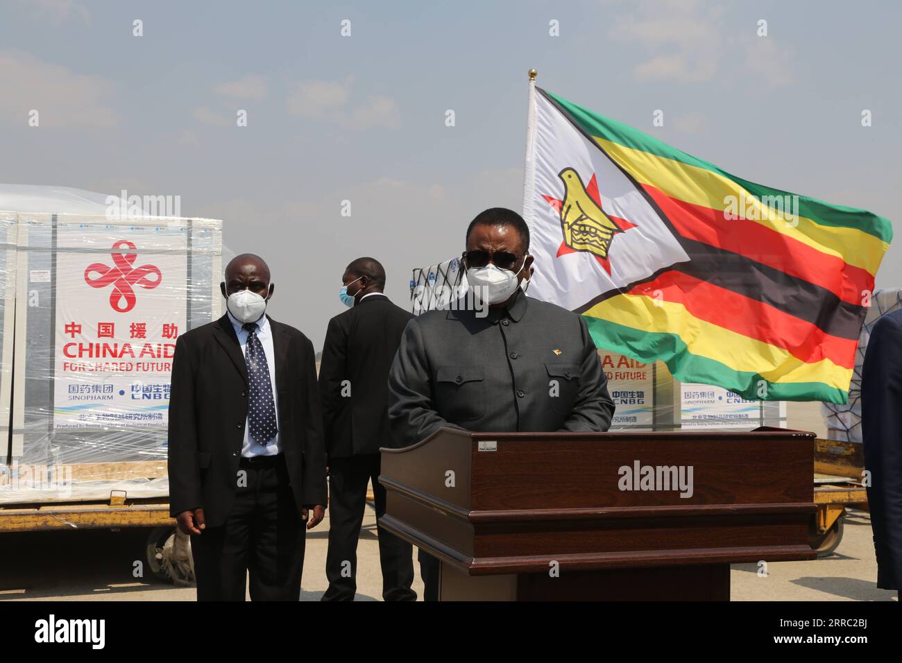 211014 -- HARARE, Oct. 14, 2021 -- Zimbabwean Vice President Constantino Chiwenga speaks during a handover ceremony of China-donated vaccines at Robert Gabriel Mugabe International Airport in Harare, Zimbabwe, on Sept. 26, 2021. Photo by /Xinhua Xinhua Headlines: 1,000 USD per fake news report -- U.S. plot to discredit Chinese investments exposed by Zimbabwean daily ChenxYaqin PUBLICATIONxNOTxINxCHN Stock Photo