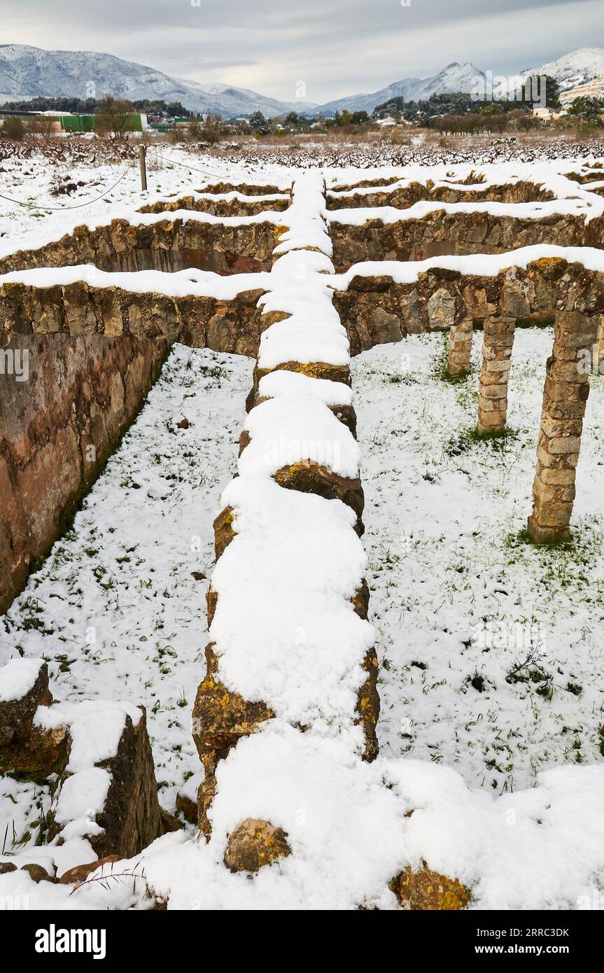 Bassa dels Arcs, a XVIII century water reservoir, covered in freshly snow (Xaló, Jalón, Vall de Pop, Marina Alta, Alicante, Valencian Community,Spain) Stock Photo