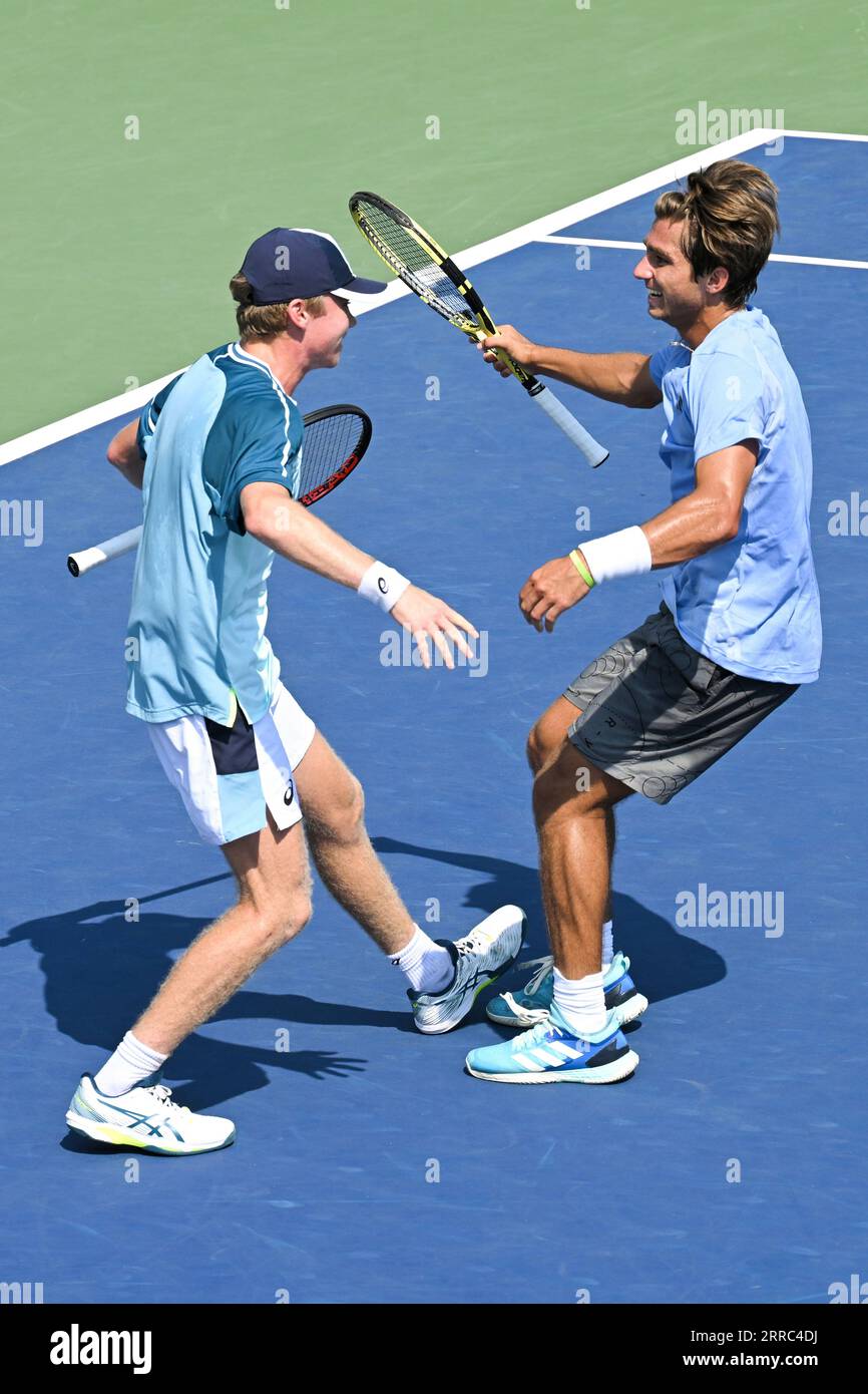 Hayden Jones and Alexander Razeghi react during a junior boys' doubles ...