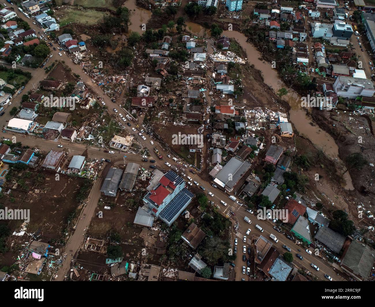An aerial view of flooded homes destroyed by a deadly cyclone in Roca ...