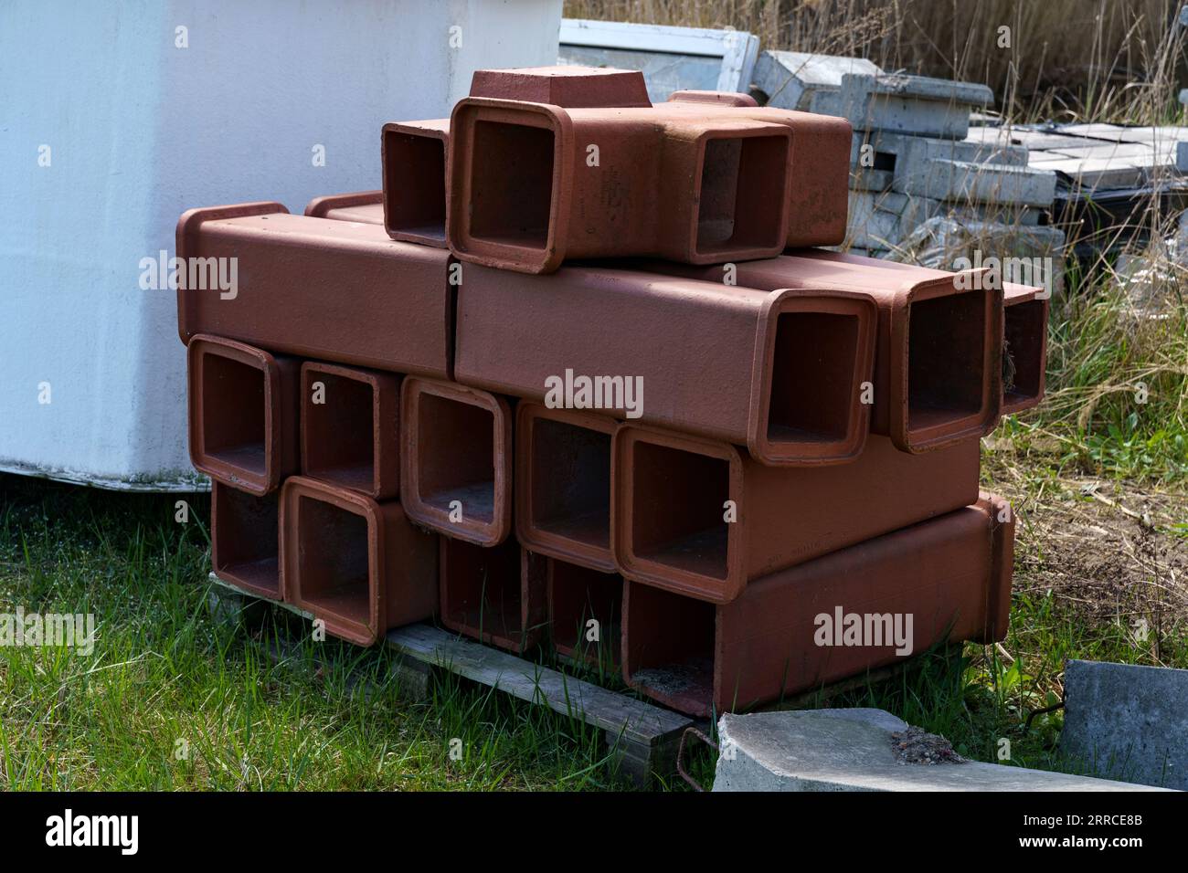 On the construction site are ceramic chimney modules. Stock Photo