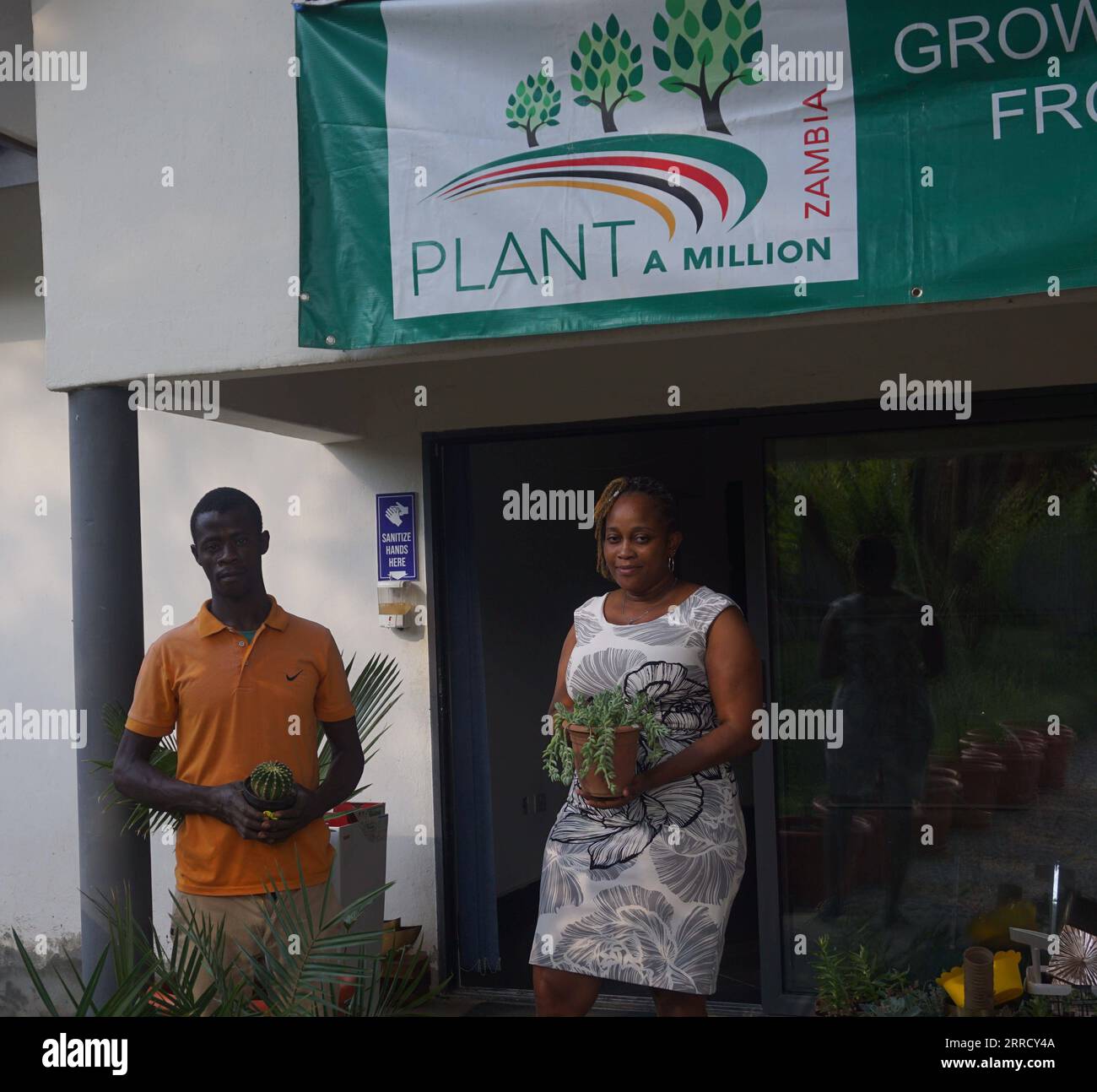 211122 LUSAKA, Nov. 22, 2021 Employees of Plant A Million pose