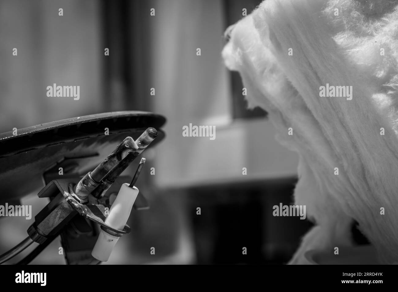 Hot water heater burner pan and element being replaced Stock Photo Alamy