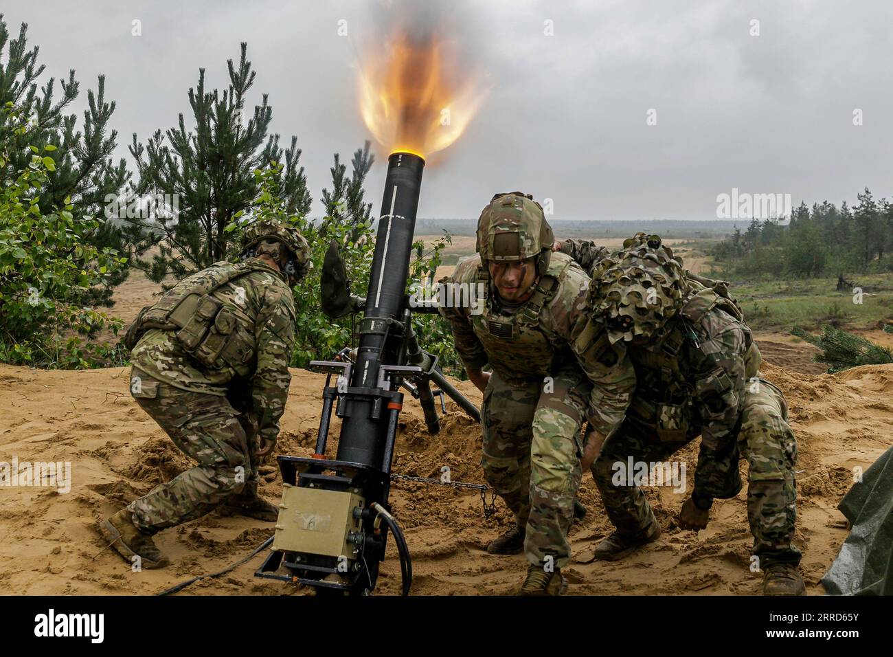 Camp Adazi, Latvia. 28th Aug, 2023. U.S. Army mortarmen assigned to 1st Battalion, 506th Infantry Regiment Red Currahee 1st Infantry Brigade Combat Team, 101st Airborne Division (Air Assault), supporting 4th Infantry Division, fire an M120A1 120 mm towed mortar system during a fire support coordination exercise at Camp Adazi, Latvia, Aug. 28. The 4th Inf. Div.'s mission in Europe is to engage in multinational training and exercises across the continent, working alongside NATO allies and regional security partners to provide combat-credible forces to V Corps, Americas forward deployed corps Stock Photo