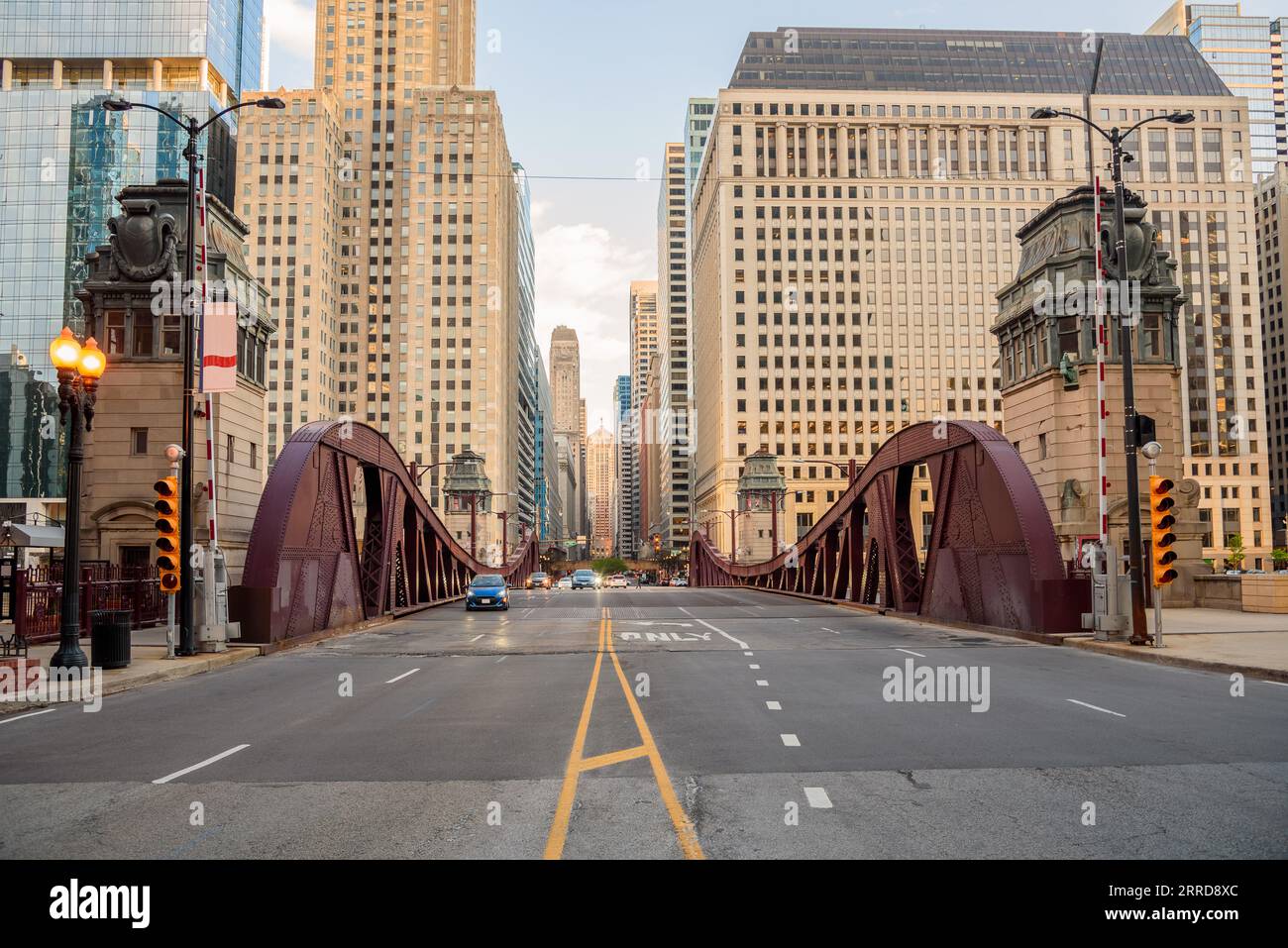 Street movable bridge in downtown Chicago at sunset in spring Stock Photo